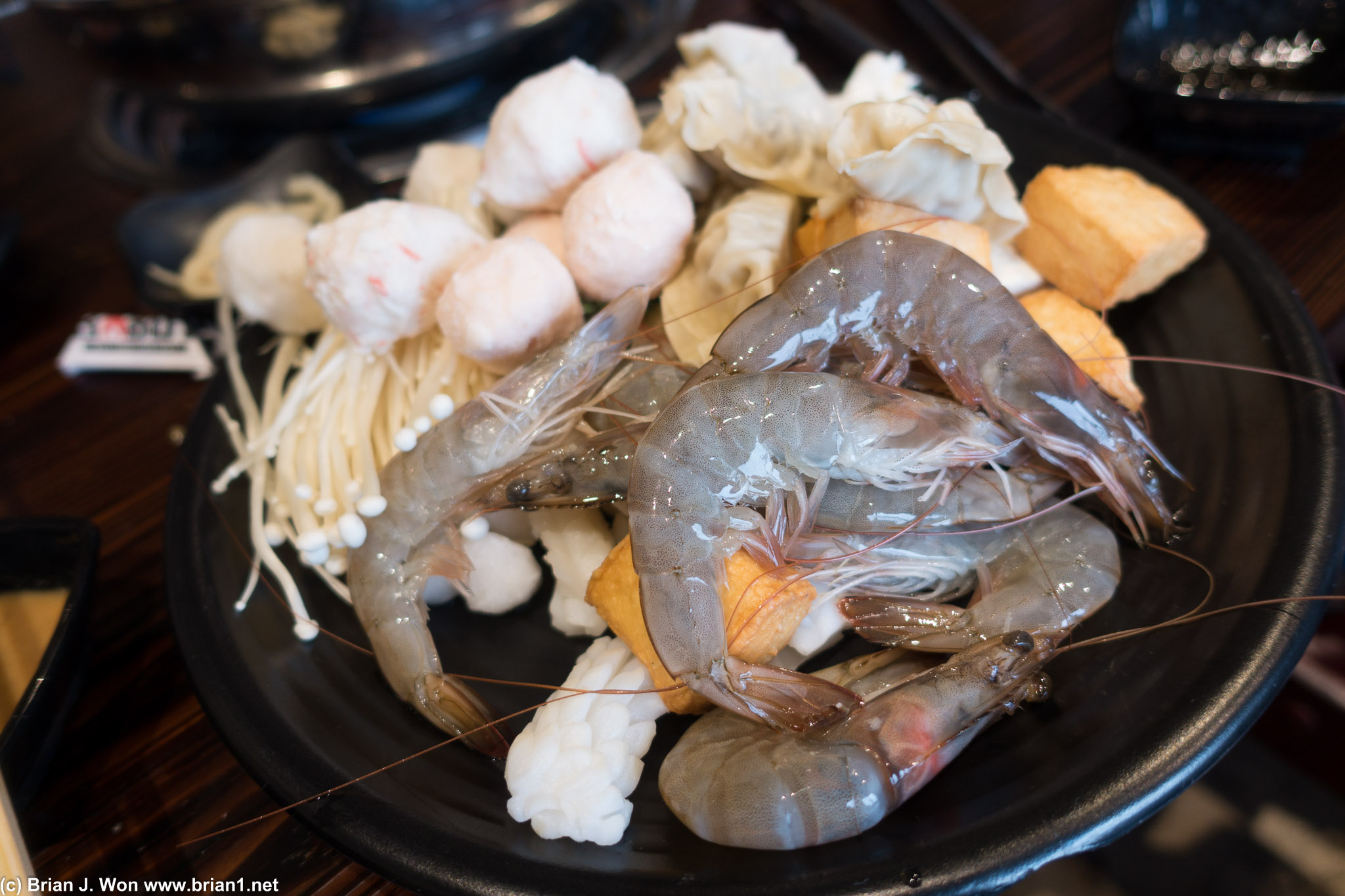 From the salad bar: shrimp, fish balls, mushrooms, tofu, and squid.
