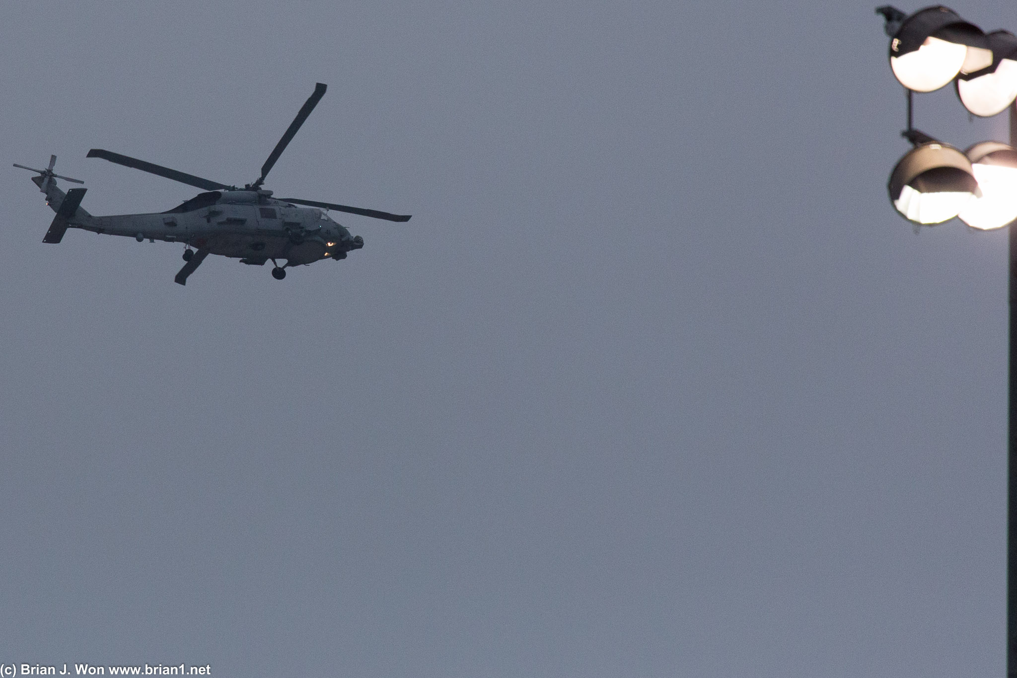 US Navy MH-60R cruising overhead.