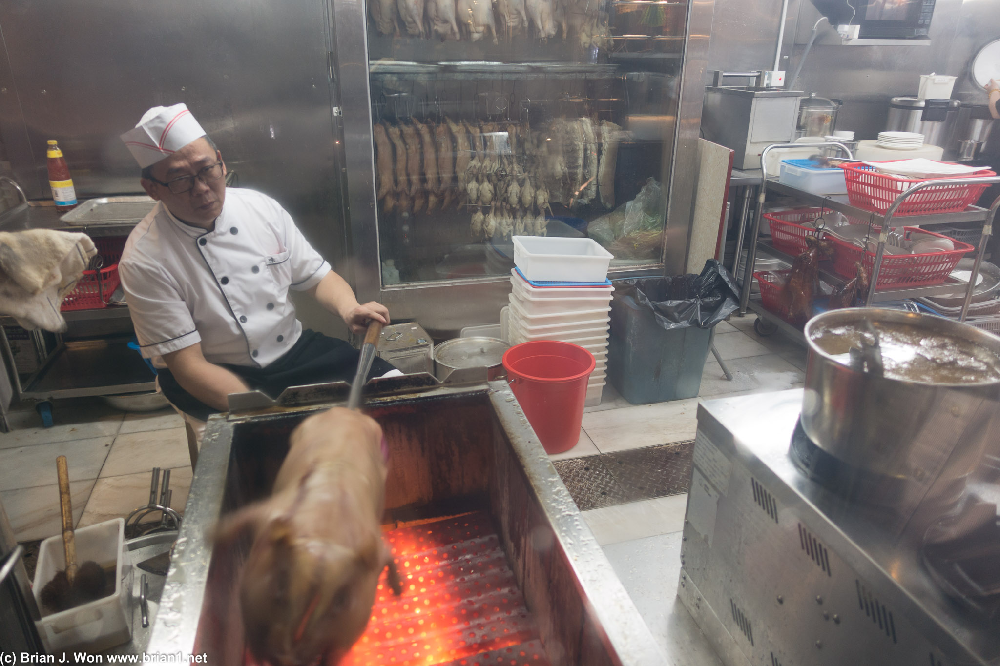 Roasting a small pig.