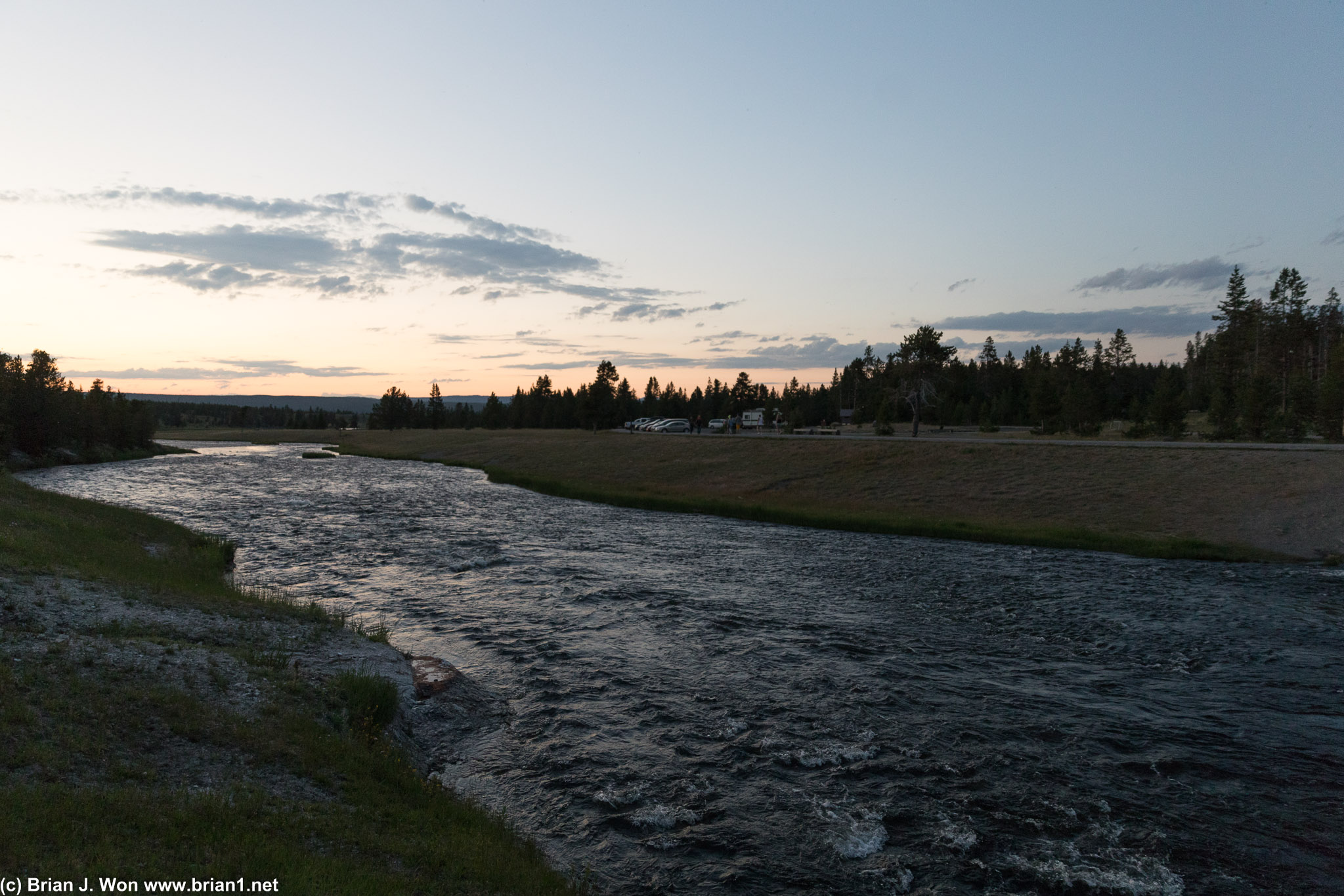 The Firehole River as it passes by Excelsior Geyser Crater at sunset.