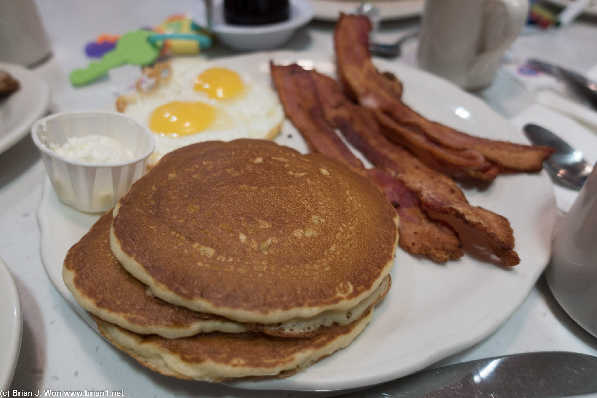 Pancakes, surprisingly decent bacon, and of course, eggs.