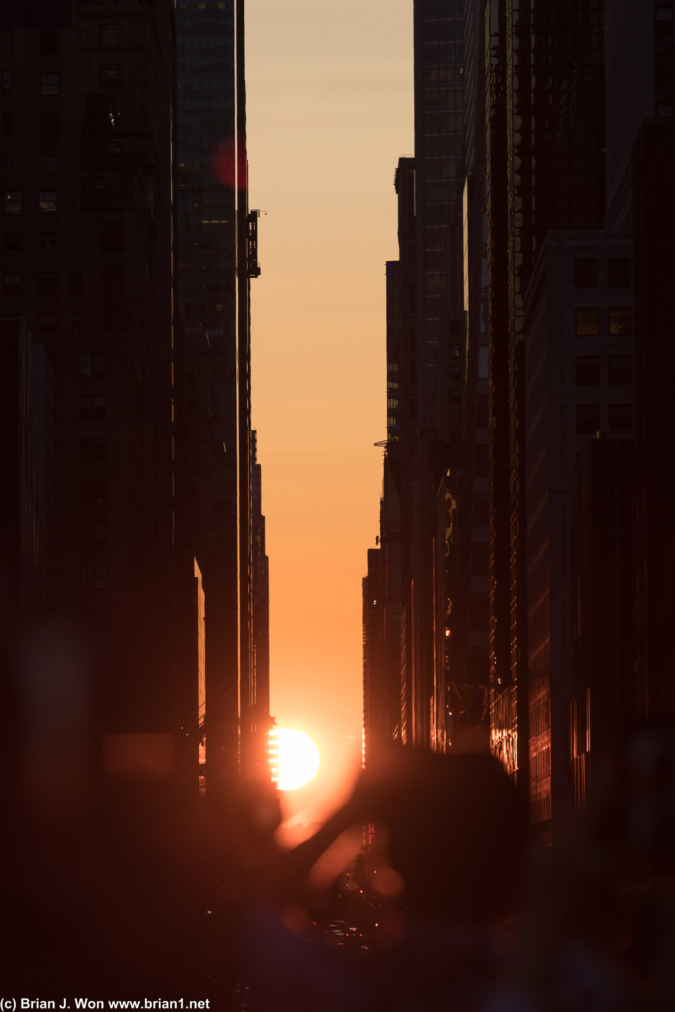 Twice a year, the sun sets straight through the streets of Manhattan.