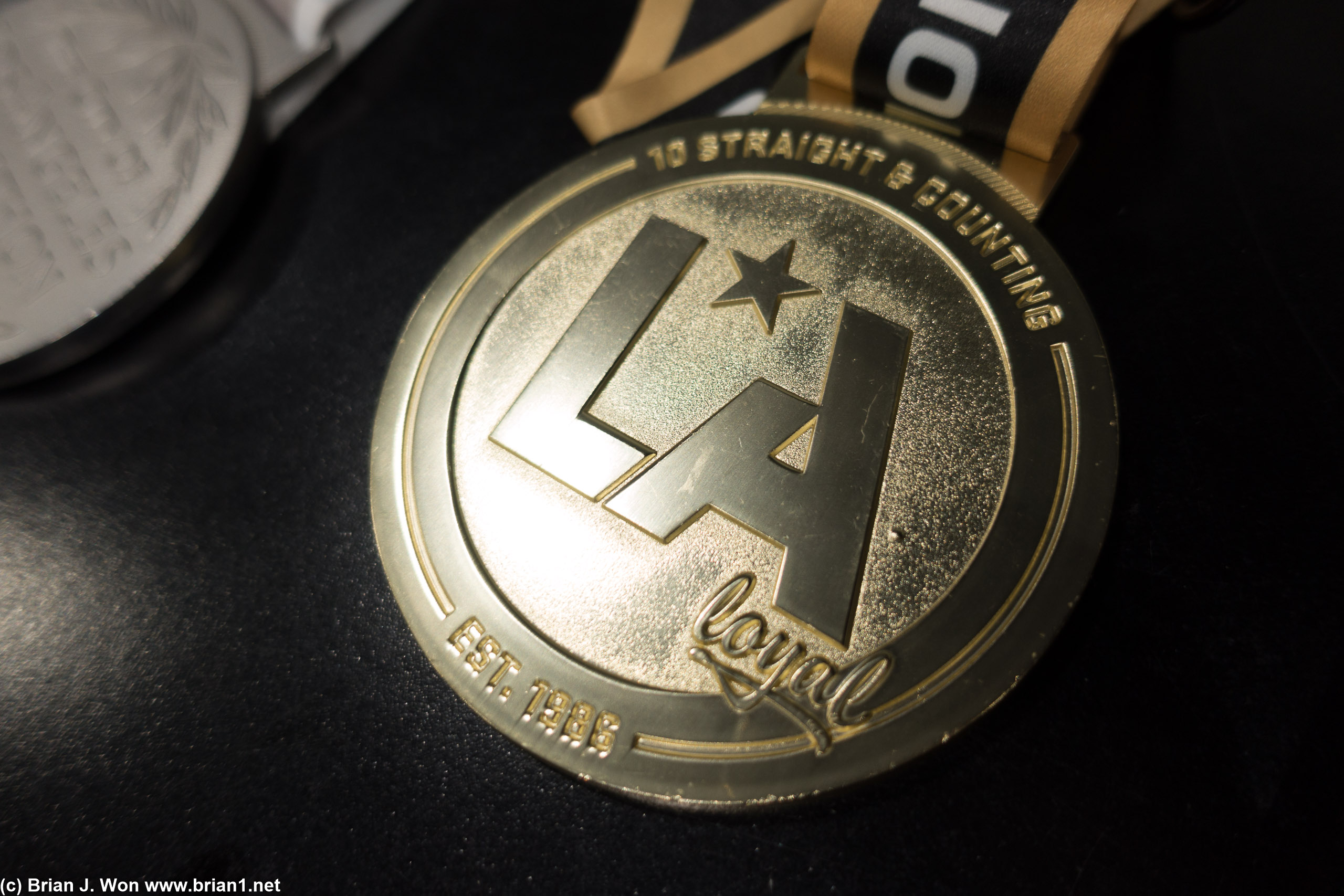 LA Loyal 10 year repeat runner medal.