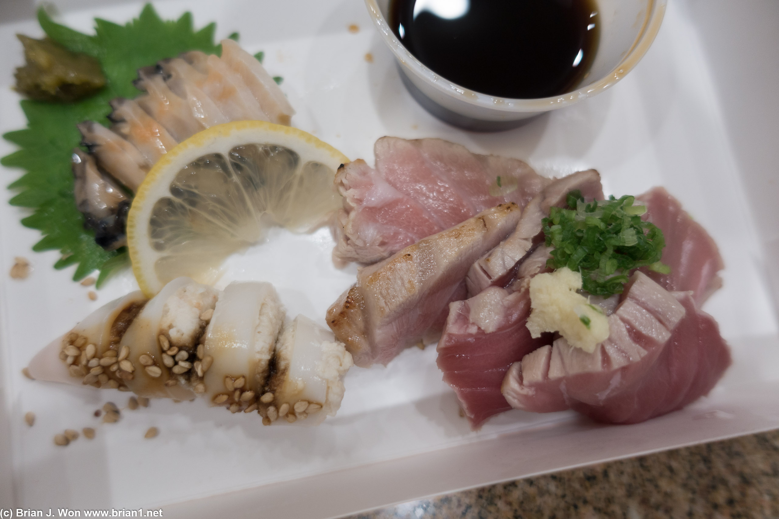 Sashimi. Abalone, sared ahi, crab-stuffed squid.