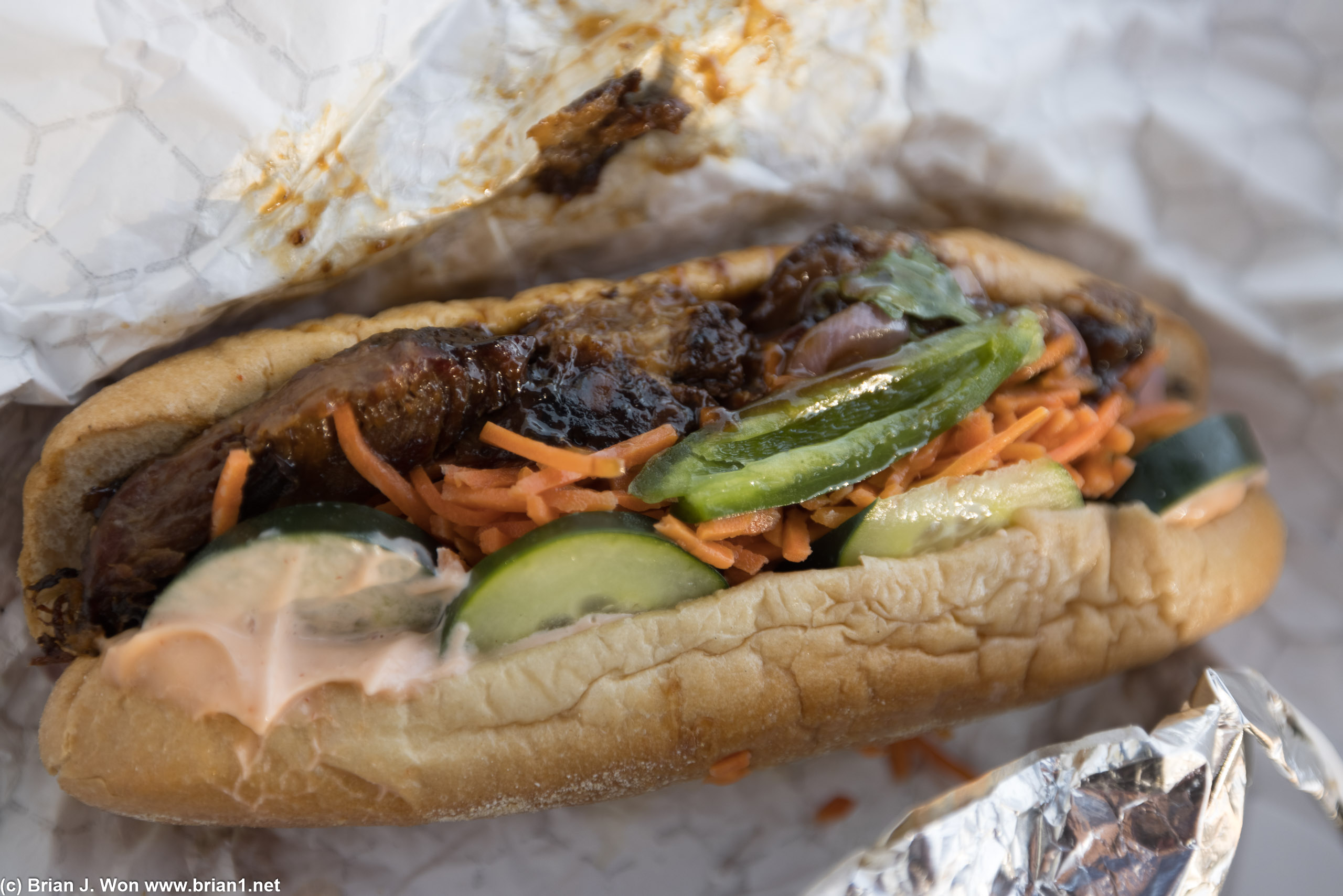 Overcooked, dry, nearly inedible pork in the banh mi. Sauce and veggies are all EXACTLY the same as in the poke.