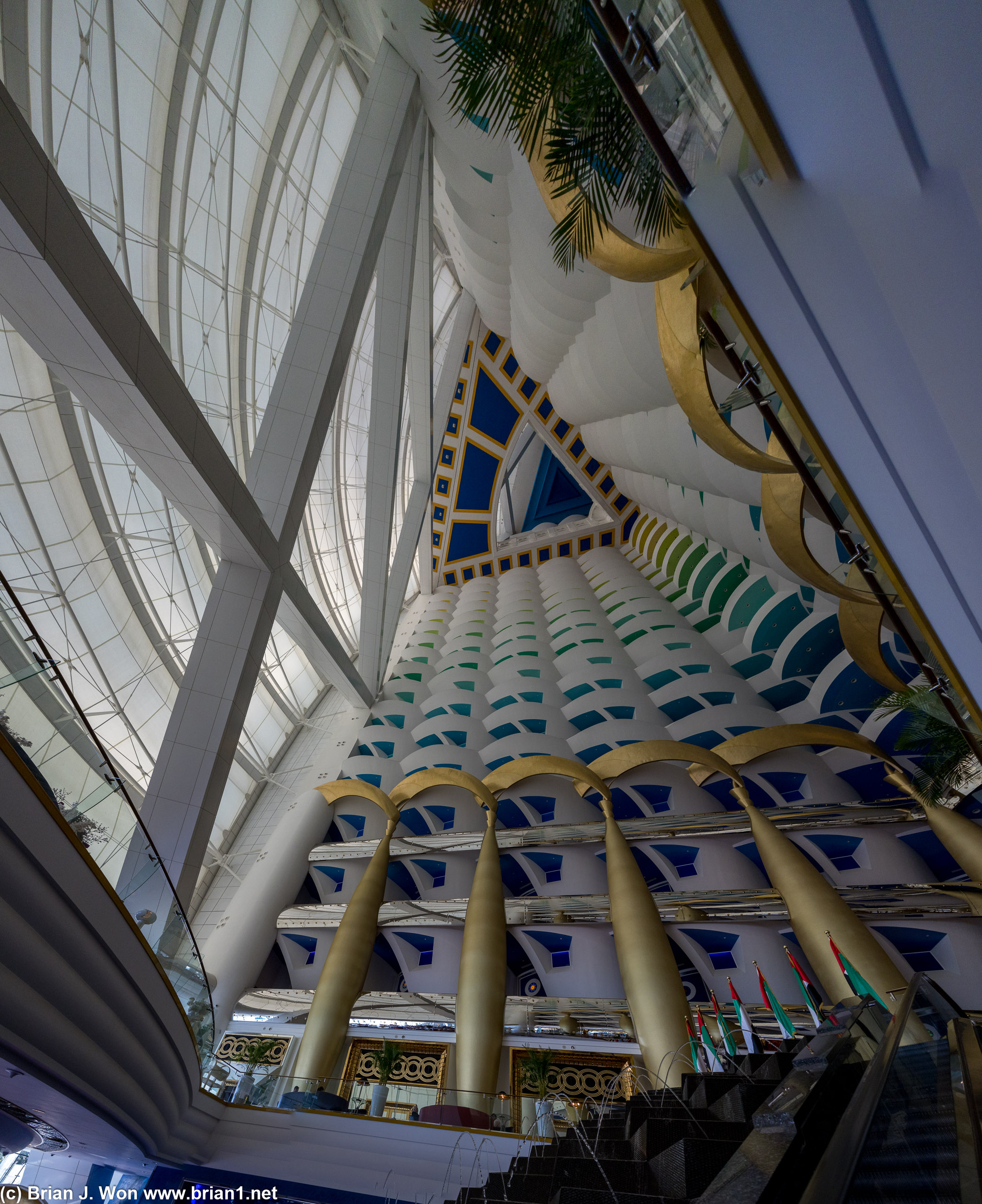 Up the escalator, looking toward the ceiling of the Burj Al Arab.