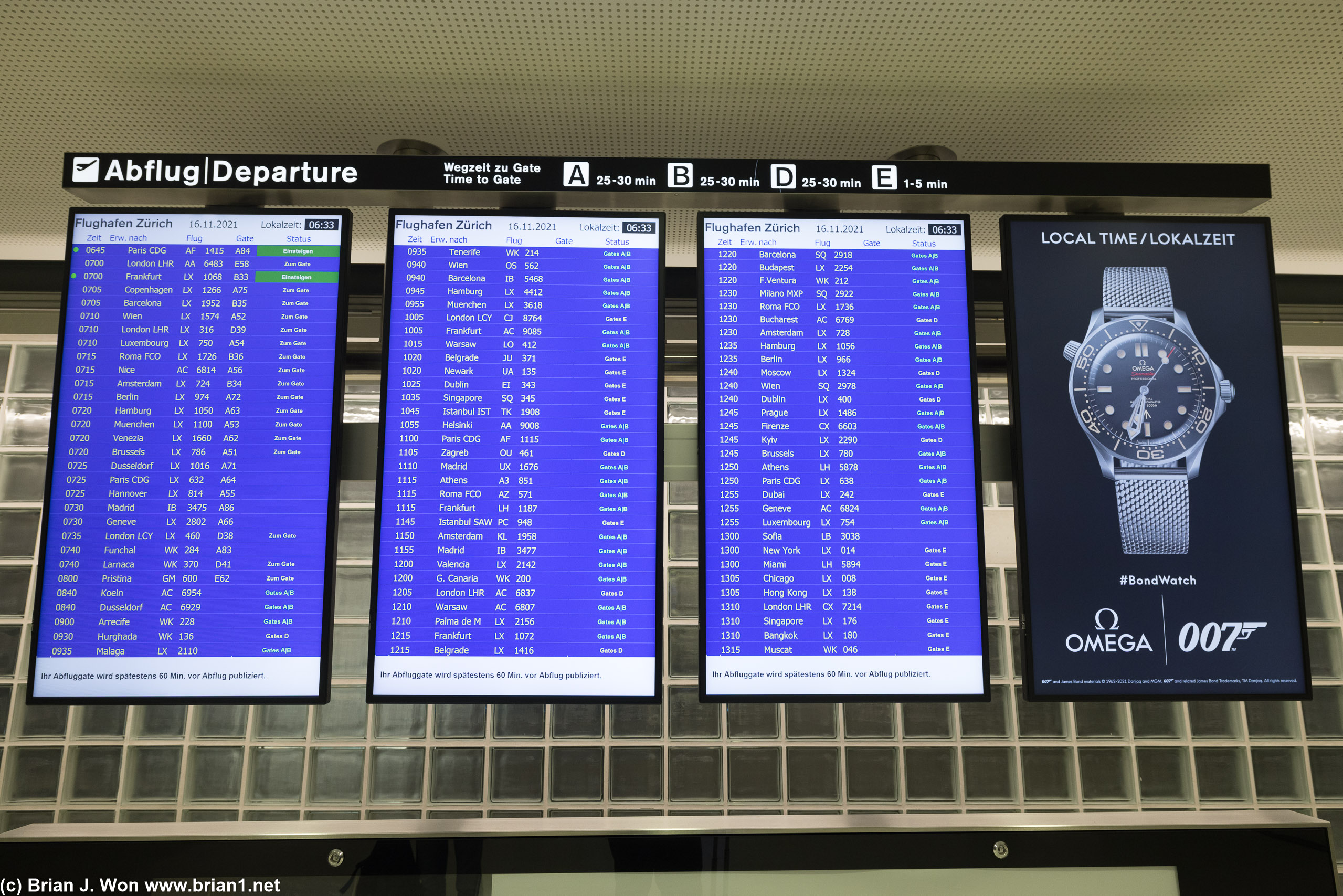 Pretty full flight board at Zurich International Airport.