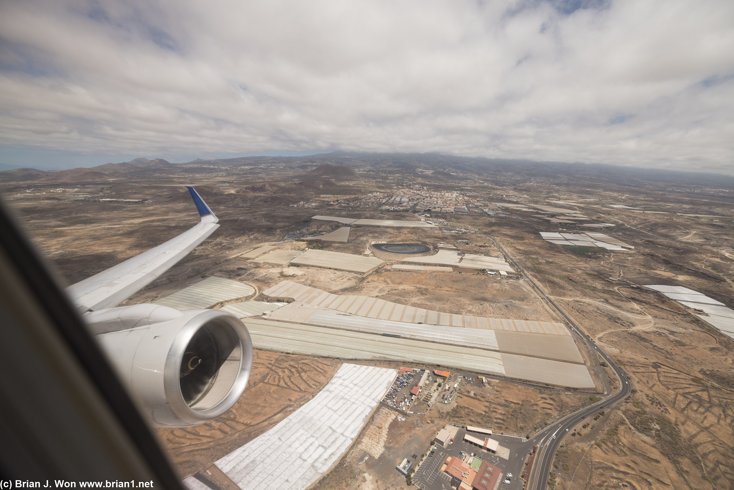 Taking off over vast greenhouses east of Tenerife South.