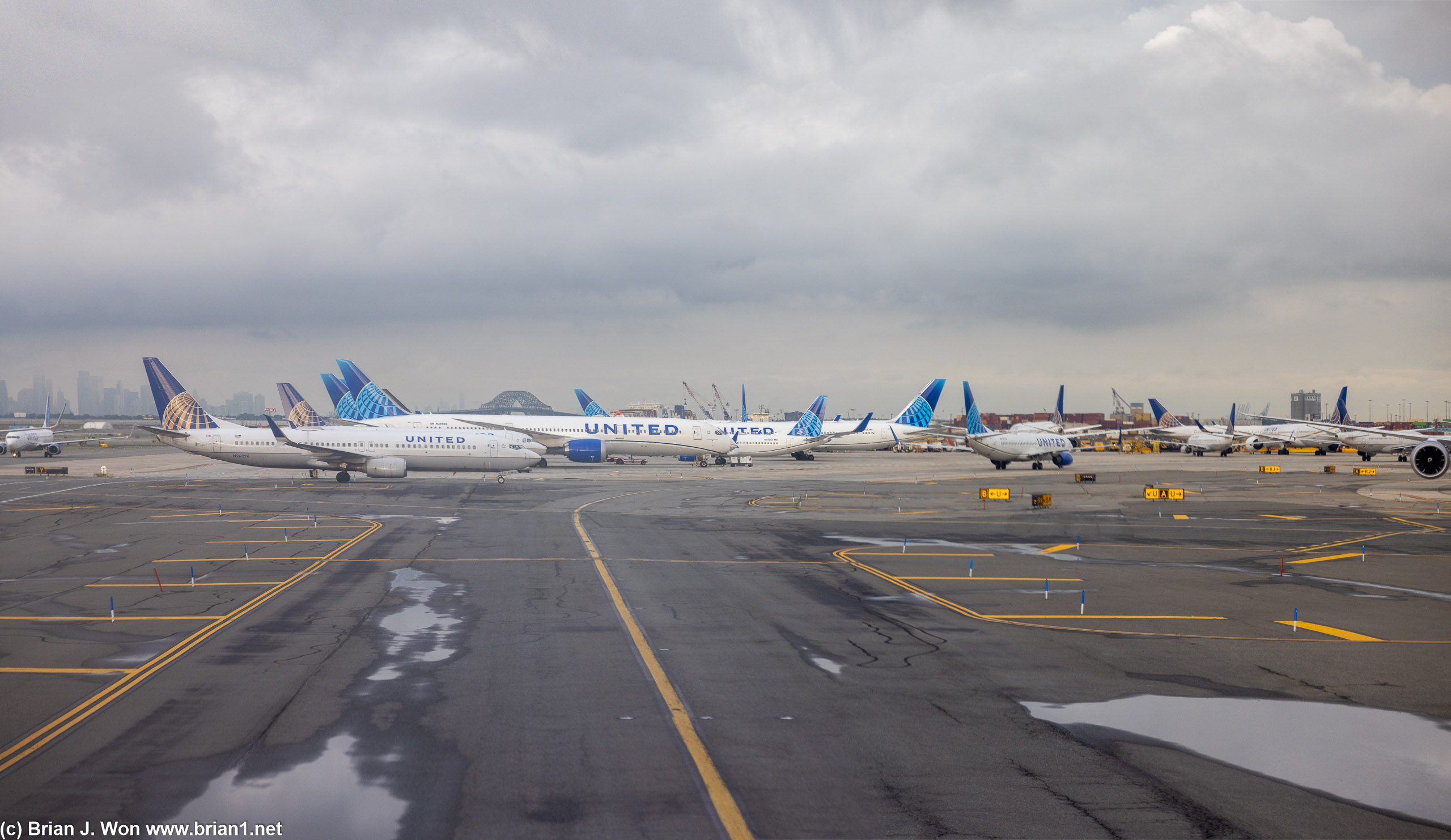 There's a lot of airplanes on the ground at Newark Airport.