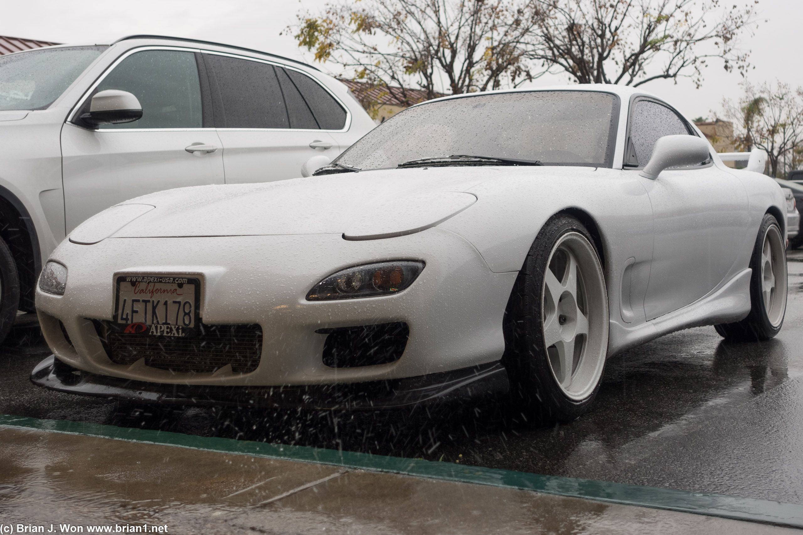 Very clean FD RX-7 parked outisde.