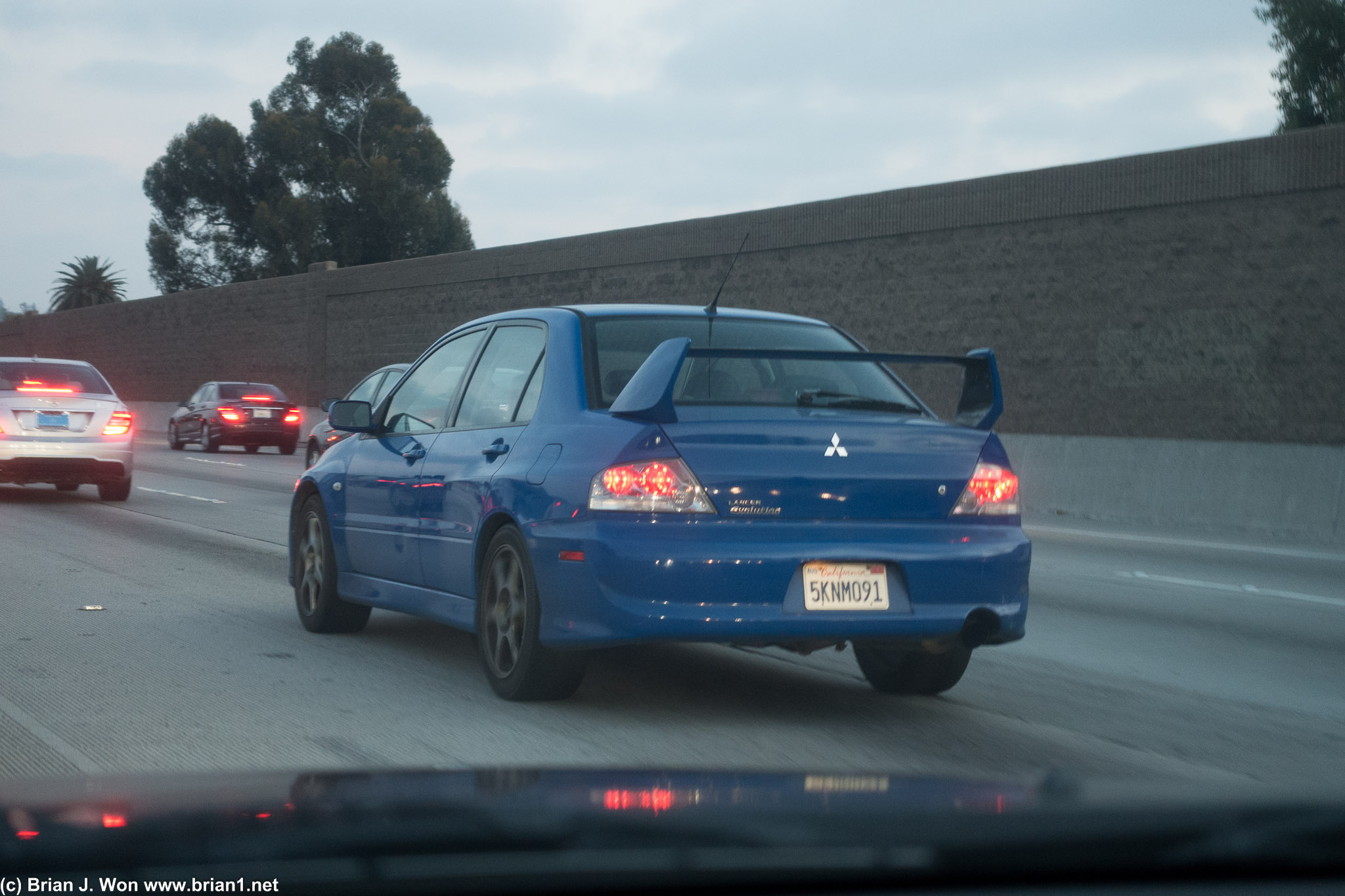 *gasp* a stock Evo 8... complete with a middle-aged white lady driving it!