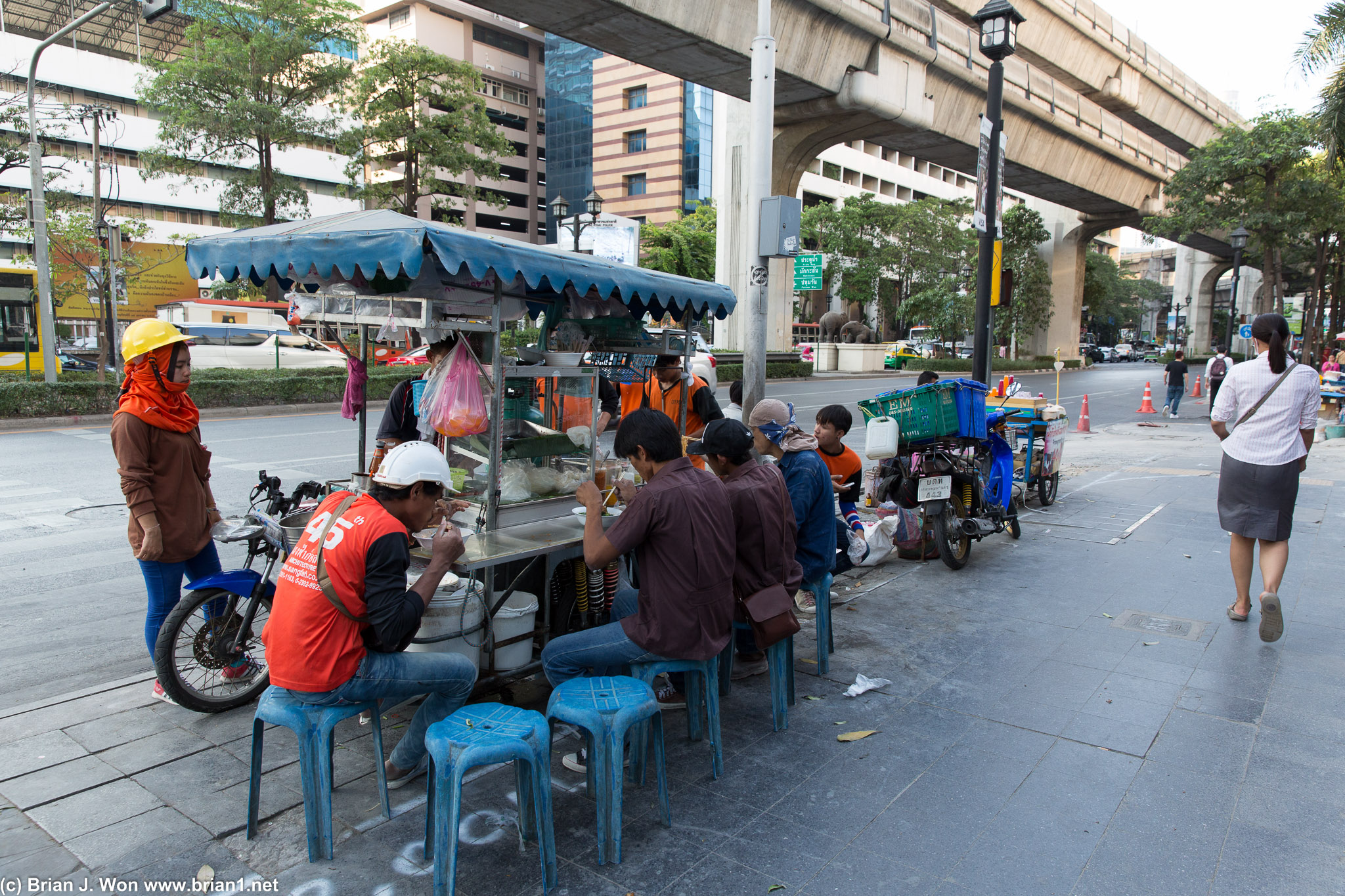 Little stall full of locals eating dinner.