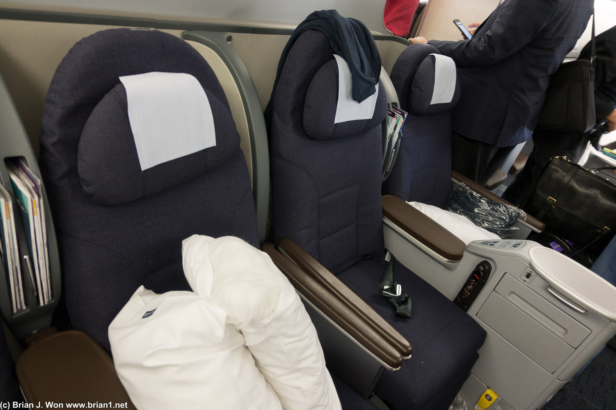 2-4-2 seating is cramped for a business class product.