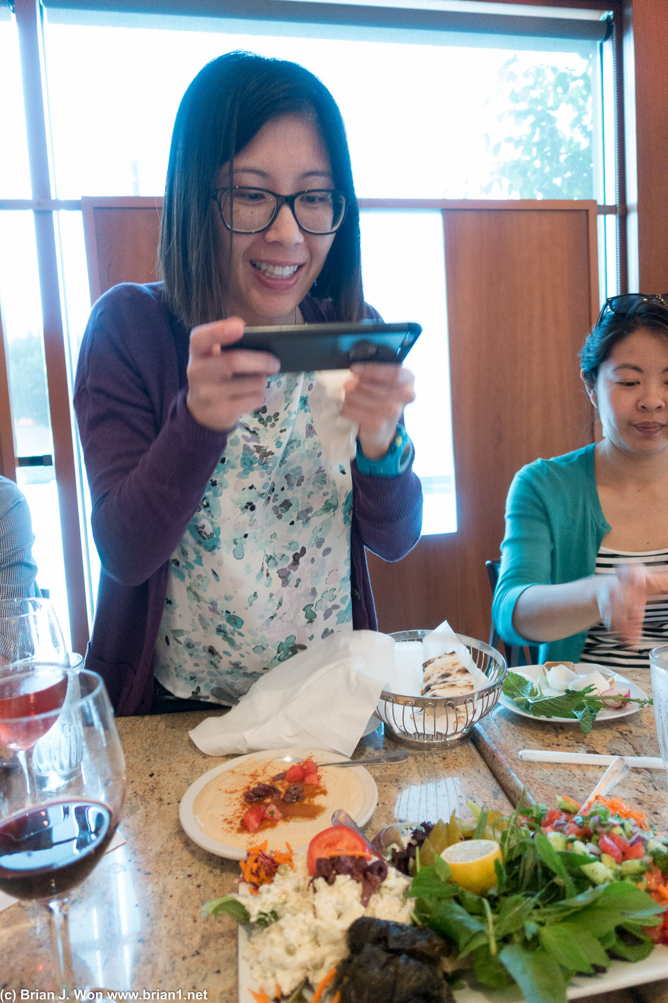 More Asians taking photos of food.
