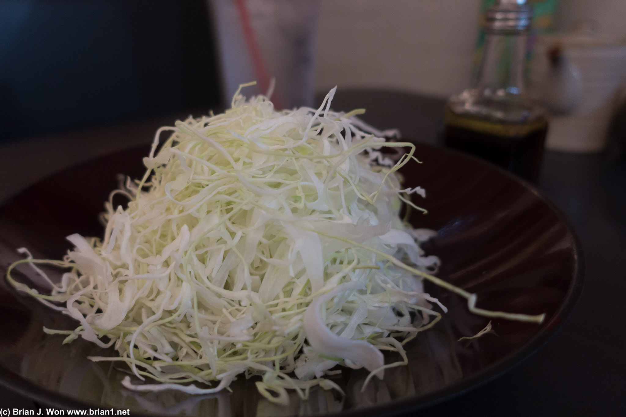 Pile of shredding cabbage is what Kimikatsu calls "salad."