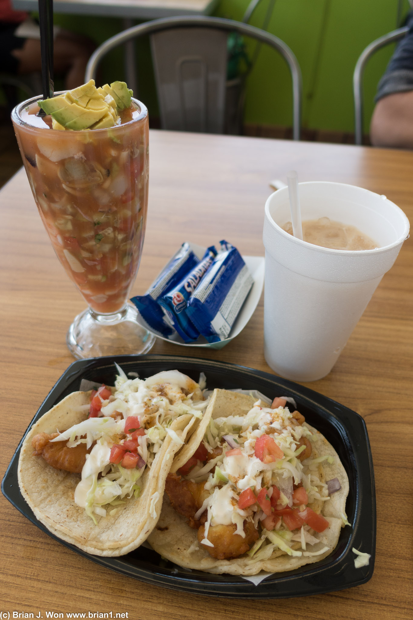 Seafood cocktail, two tacos, and a horchata.