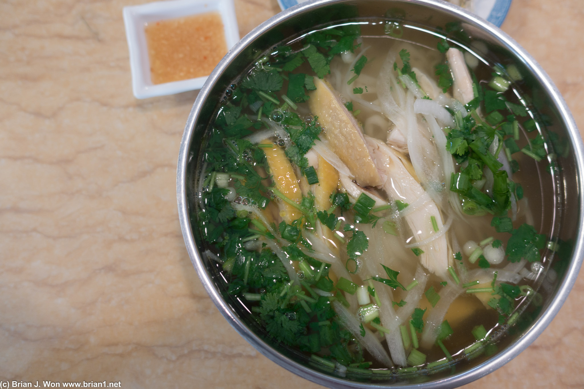 Tasty but I always find the noodles in pho ga too soft. And whoa, metal bowls??