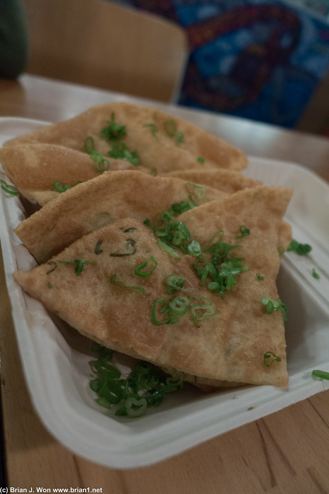 Scallion pancake. Perfectly fried but basically no taste. Scallions in the batter please the next time?