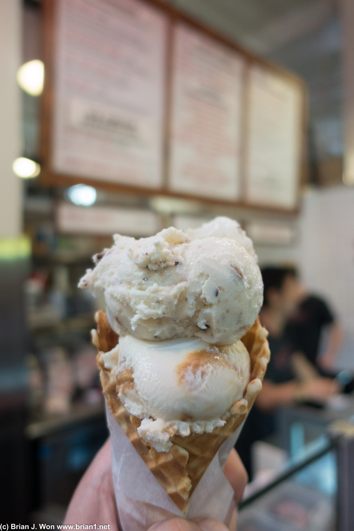 Sea salt cream and cookies atop banana & salted caramel in a waffle cone.
