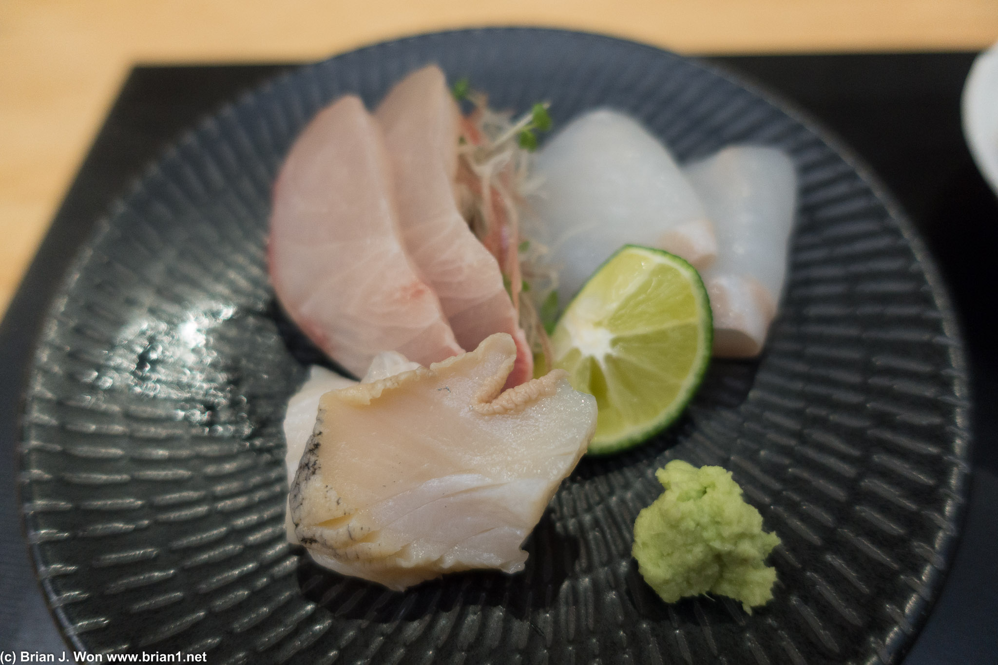 Clockwise from front: geoduck, jack mackerel, flounder.