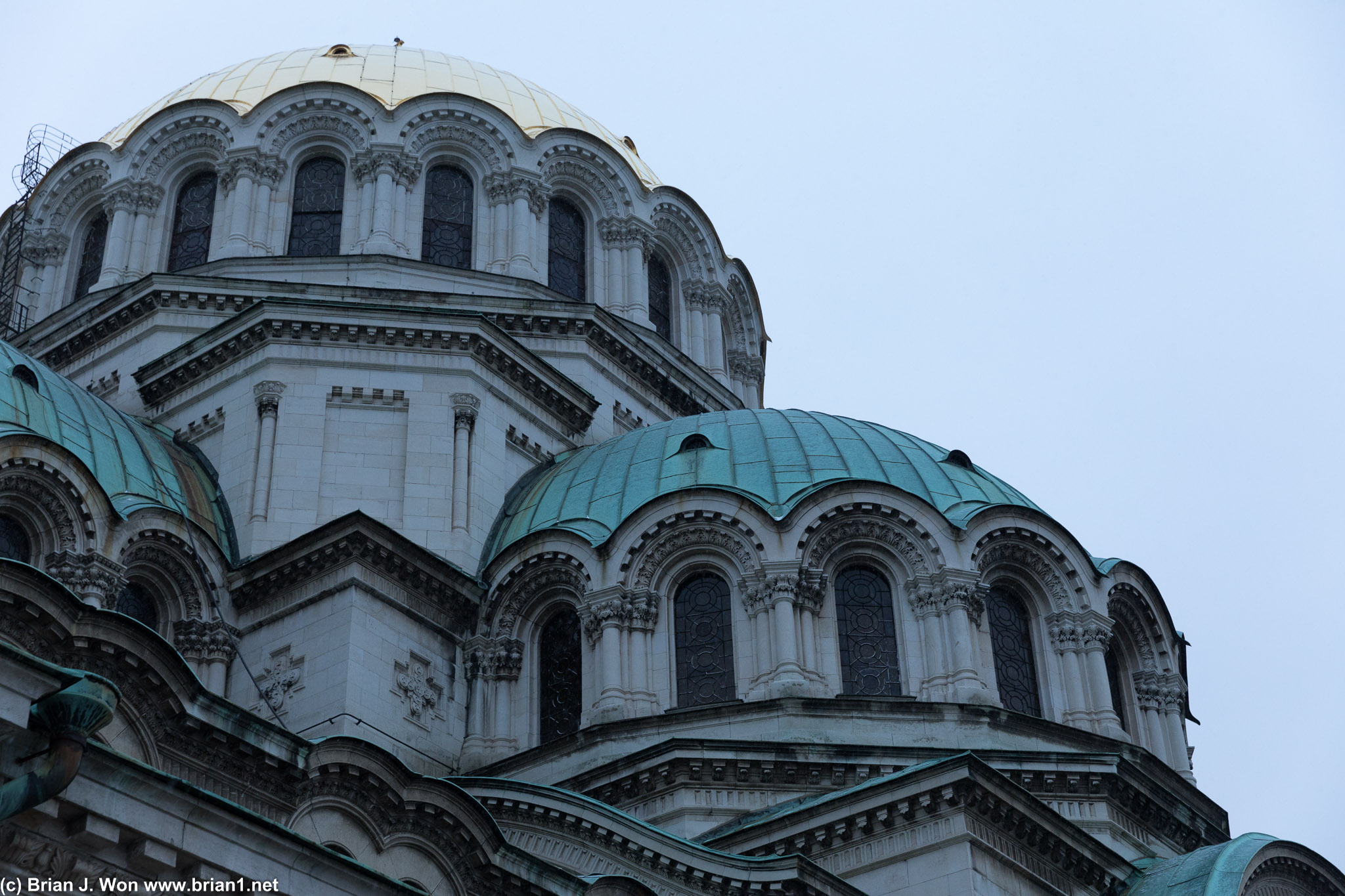 Copper domes are partially restored.