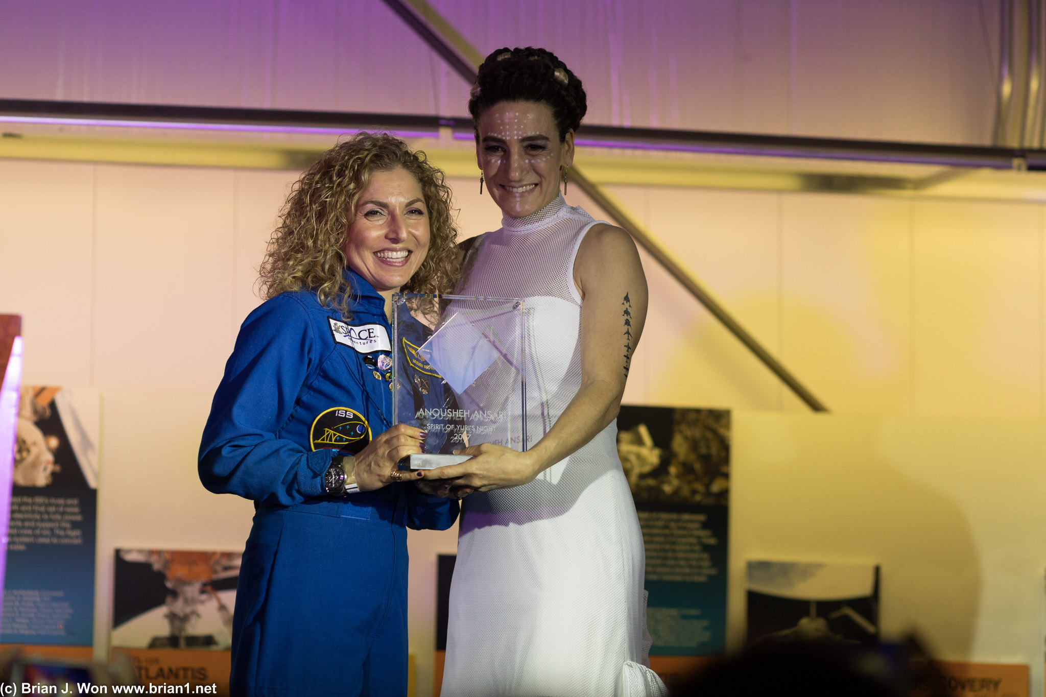 Presenting an award to Astronaut Anoushesh Anzari.