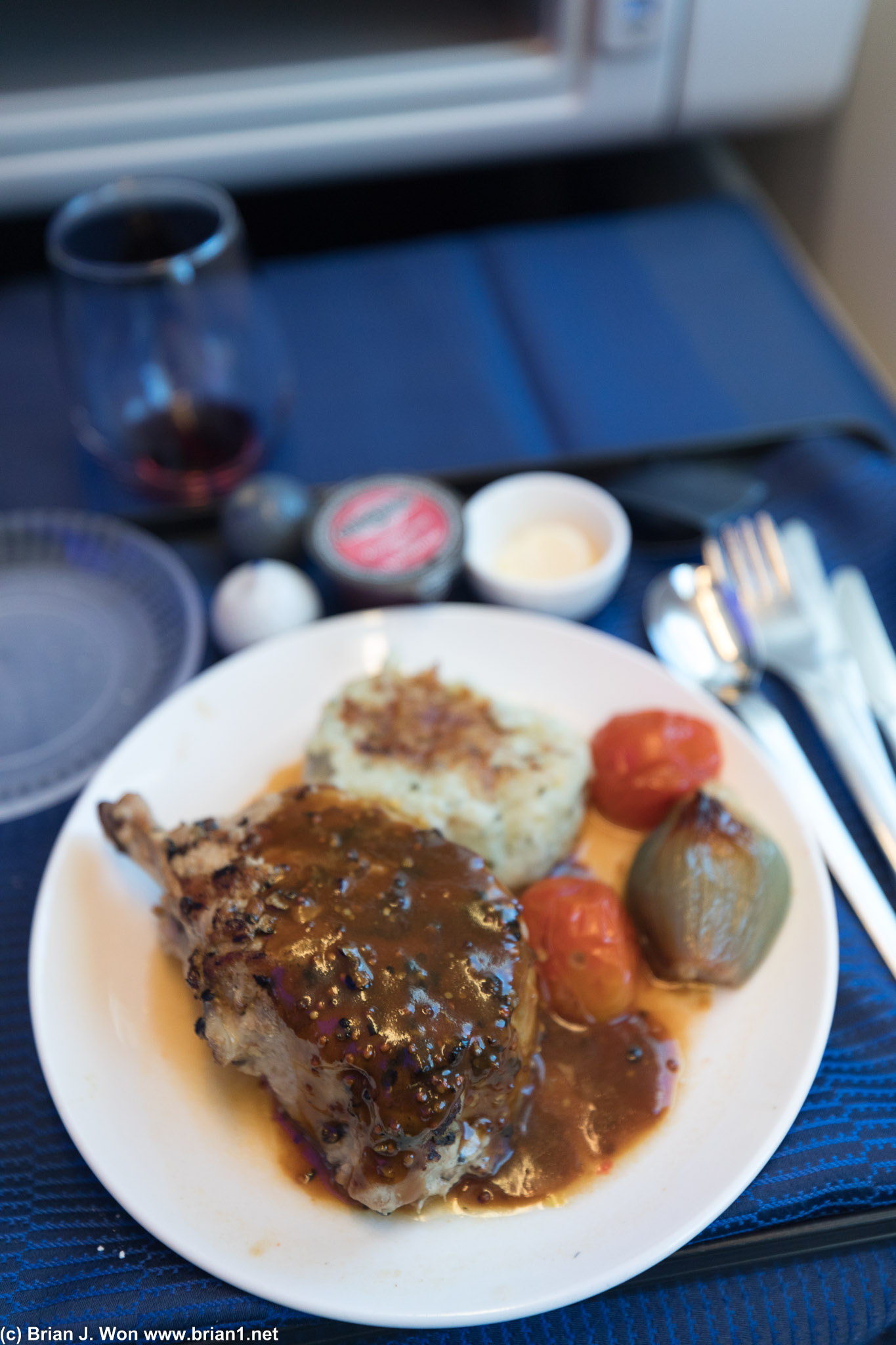 And so was the pork chop. Almost perfectly cooked-- amazing they got it right on an airplane!