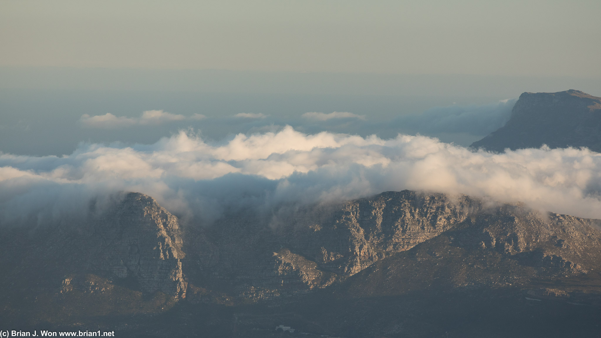 Clouds covering the mountains to the west.
