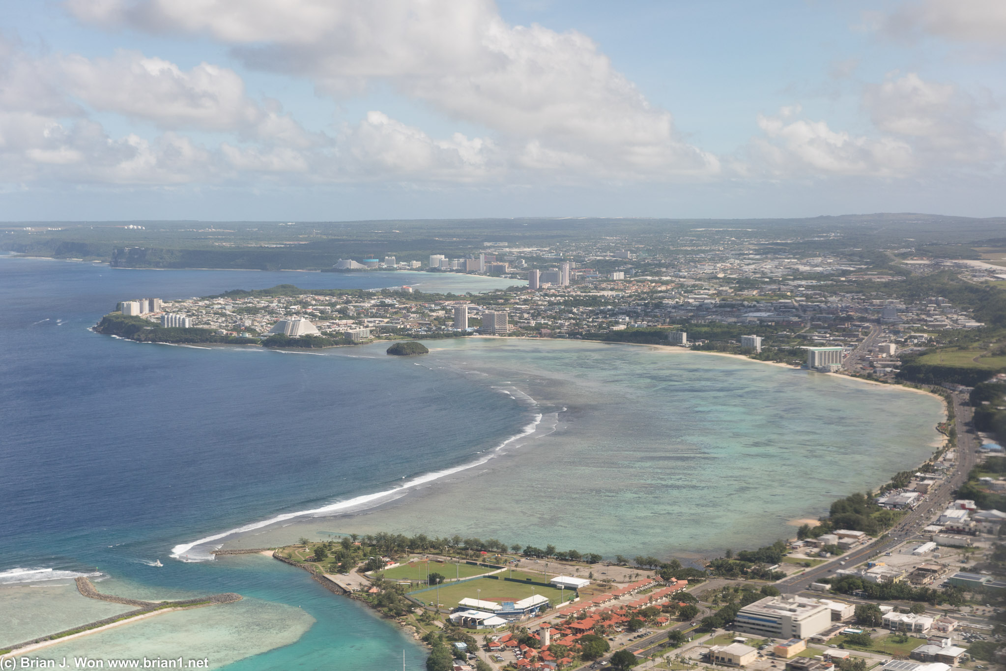 Final approach over Guam. Hagatna in the foreground.