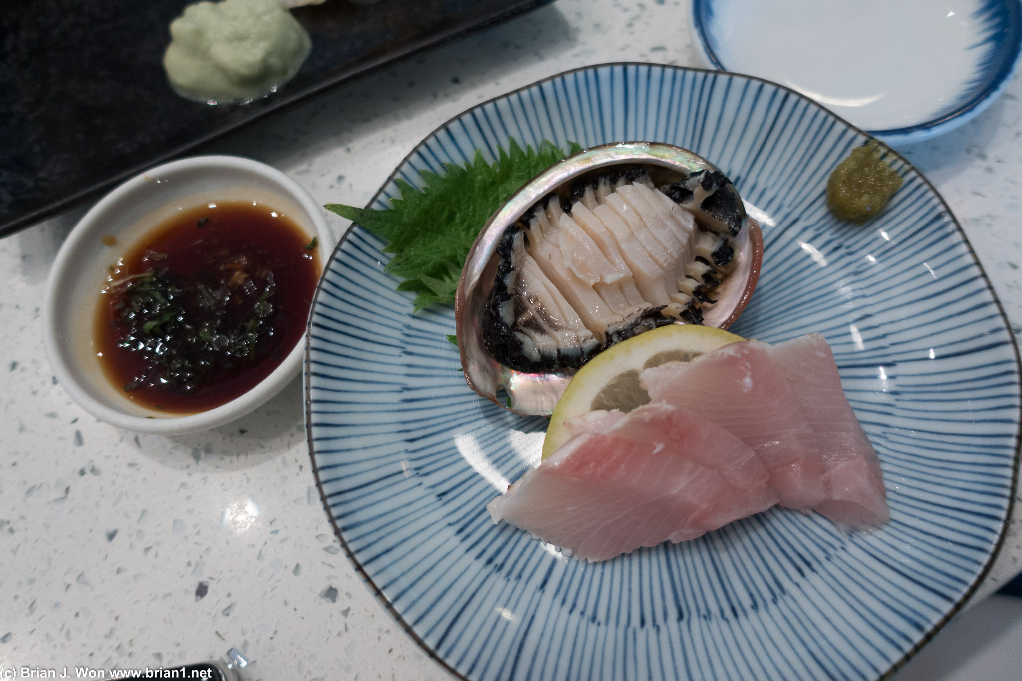Abalone and Australian hirame (yellowtail) sashimi. Abalone was surprisingly good.