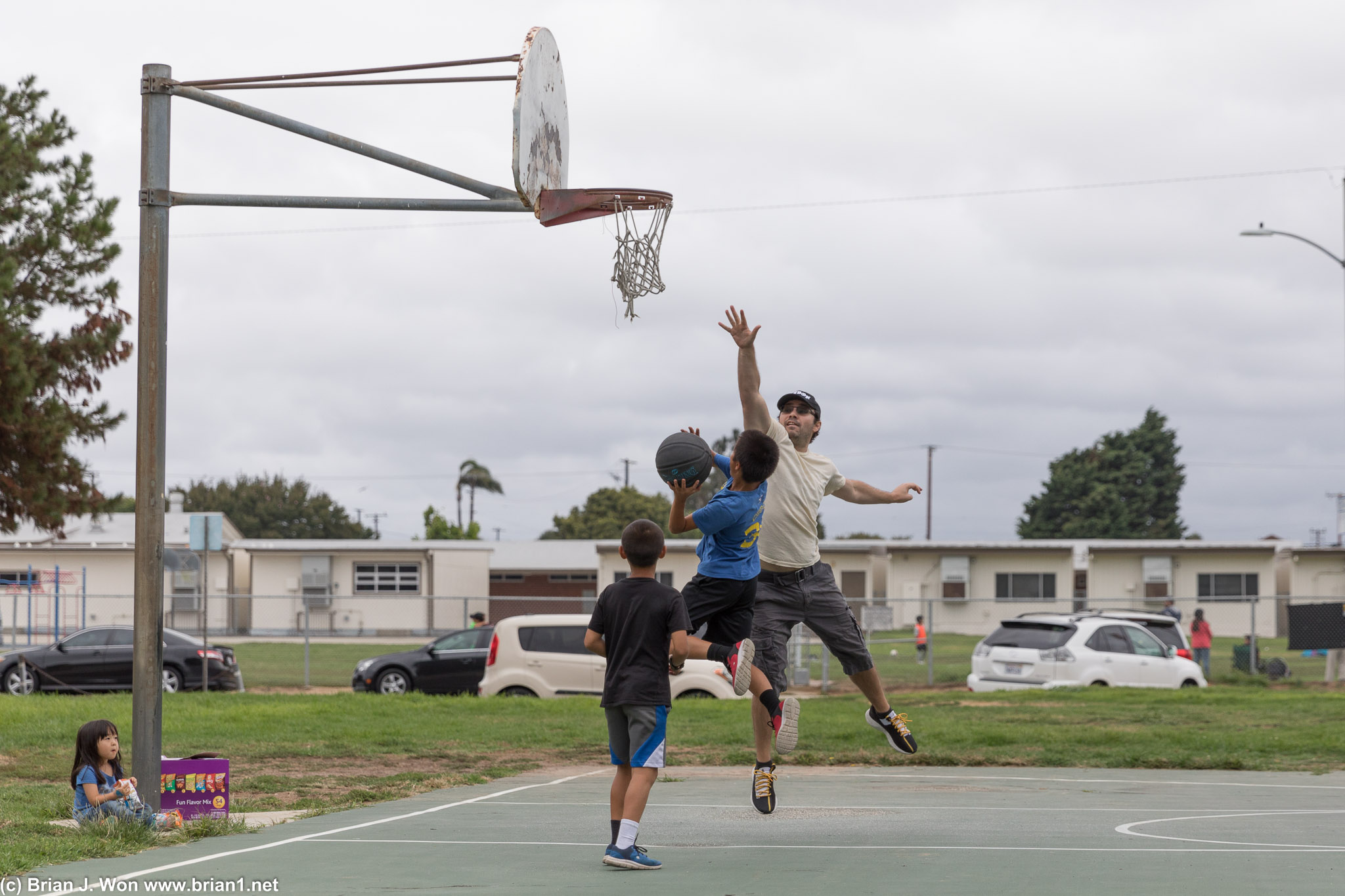 The younger generation also loves to school their elders on the basketball court.