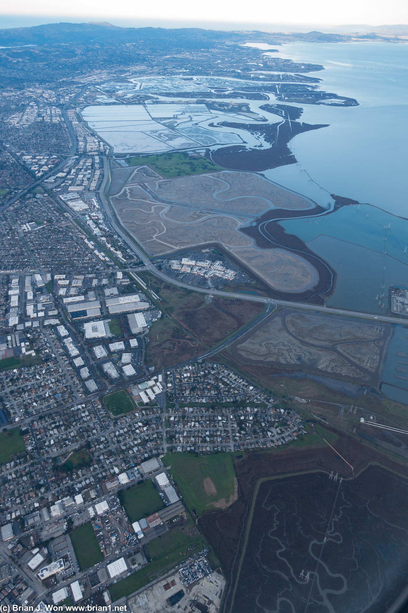 East Palo Alto in the foreground, Redwood City and Bar Island in the background.