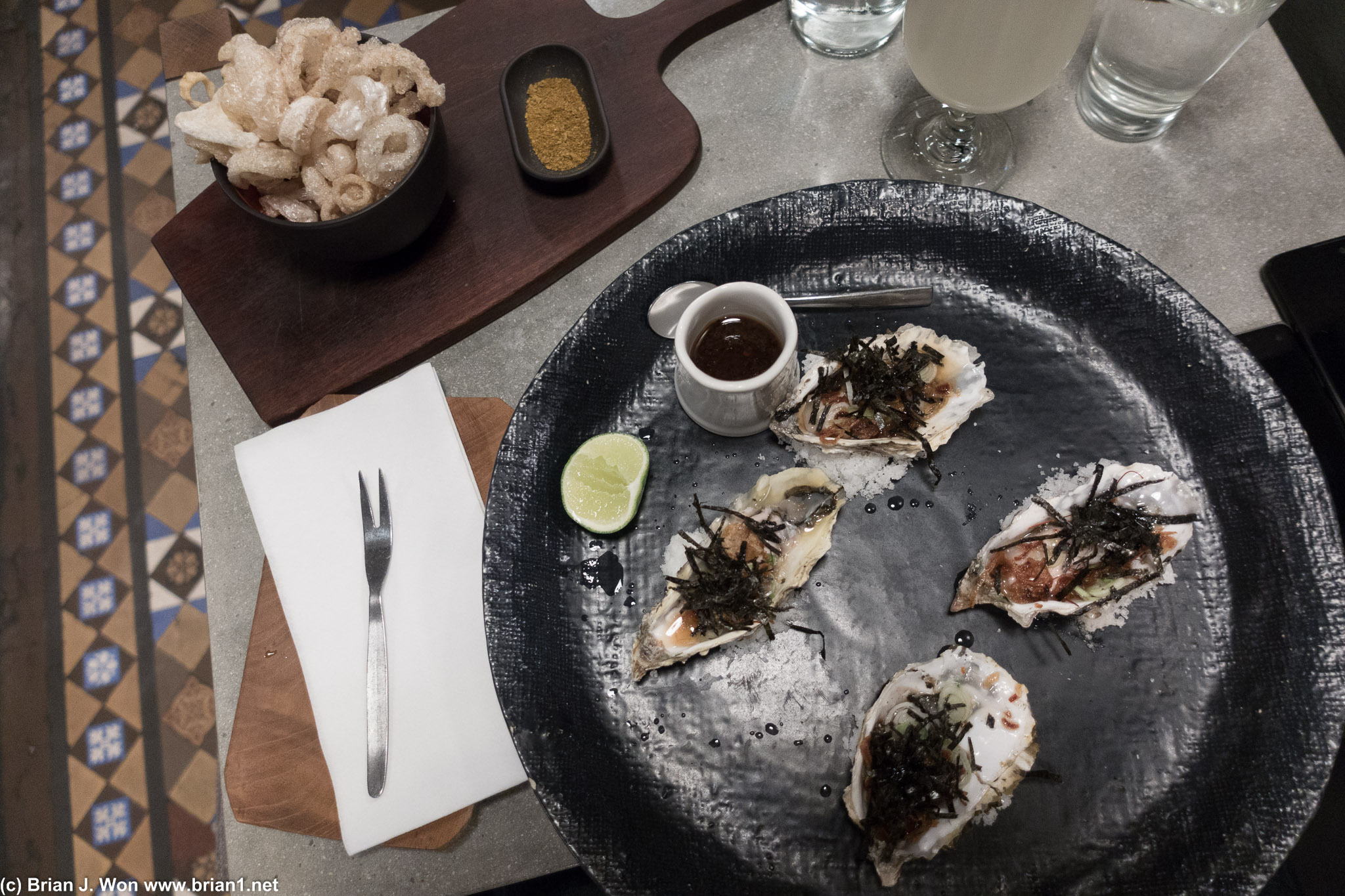 Not sure adding dried onion and seaweed makes raw oysters Vietnamese, but they were still tasty. As was the pork crackling.