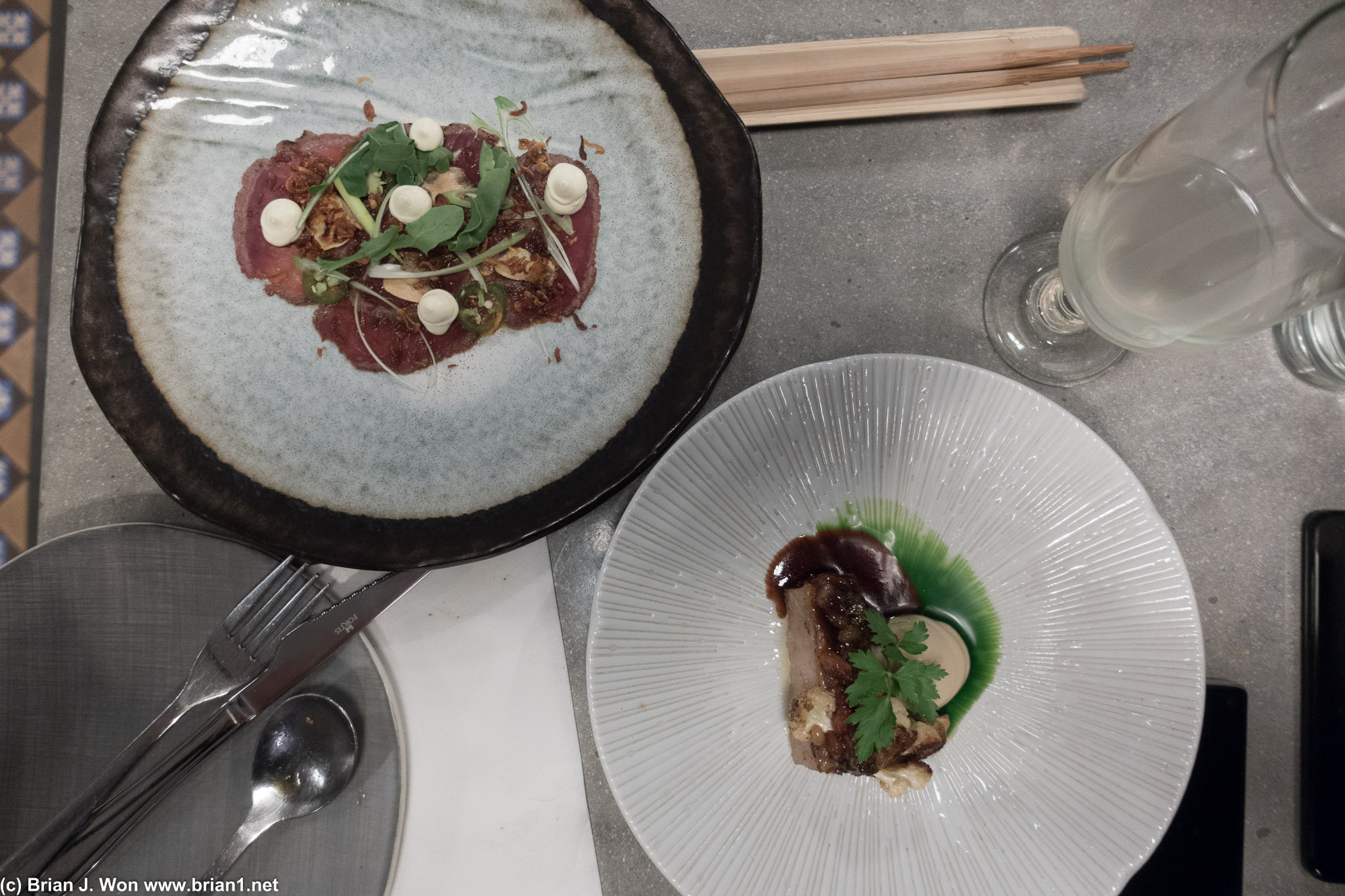 Venison tartare and pork belly. Both were best described as solid with missed potential.