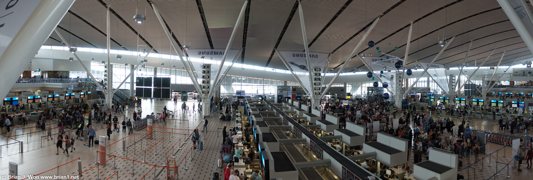 Sweeping, curving, high ceilings, like many modern airports.