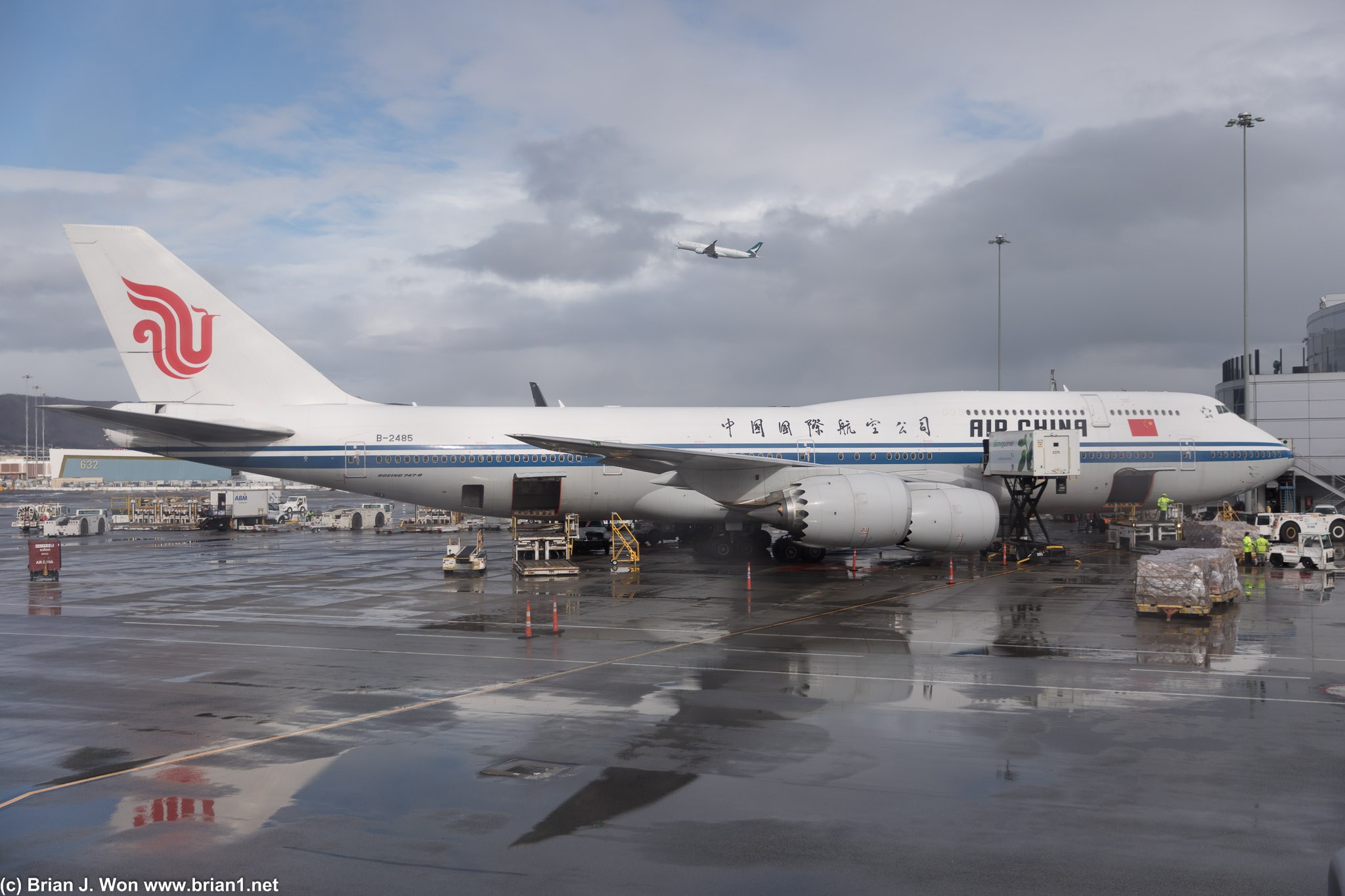 Air China 747-8i at SFO, with a Cathay Pacific Airbus A350-900 in the background.