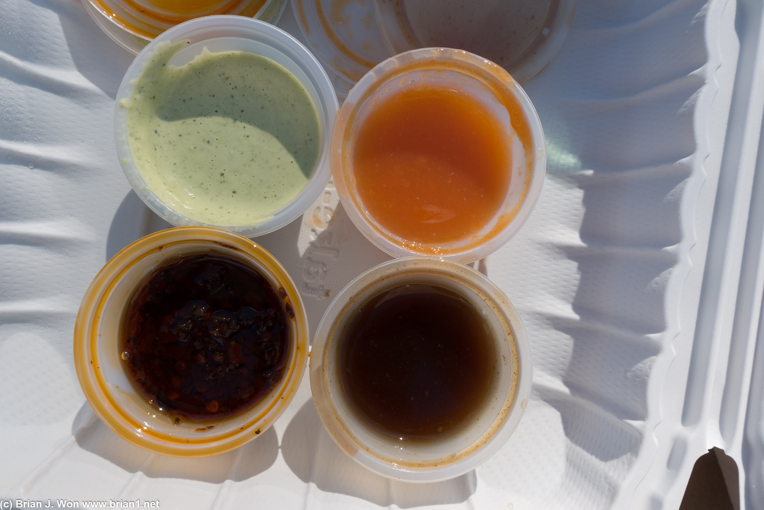 Sauces. Top left was avocado, rest were kinda-sorta-Chinese but not quite?