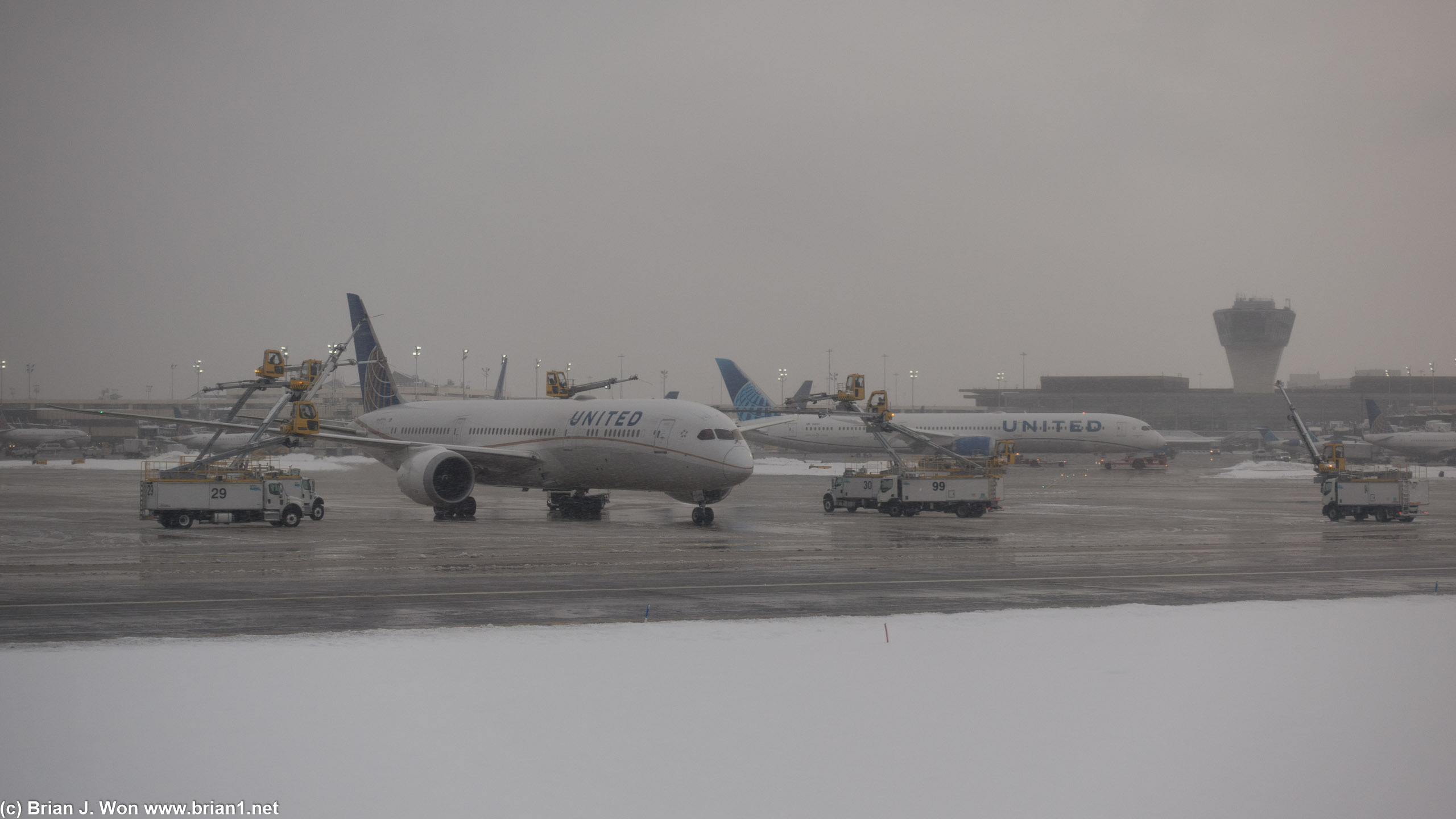 Dreamliners being de-iced after the earlier storm.