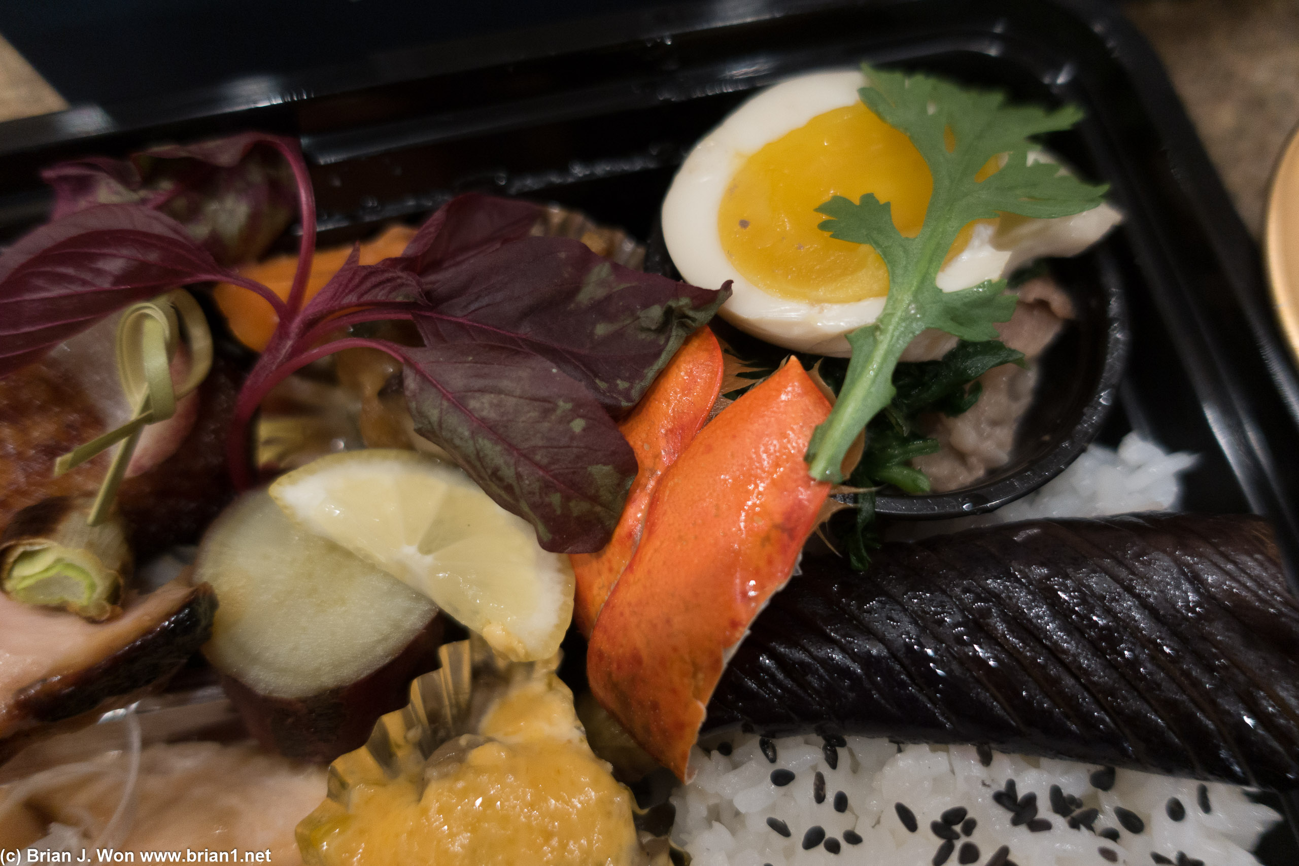 A lot of stuff packed in just one corner of the box. Note soft-boiled egg atop beef sukiyaki.