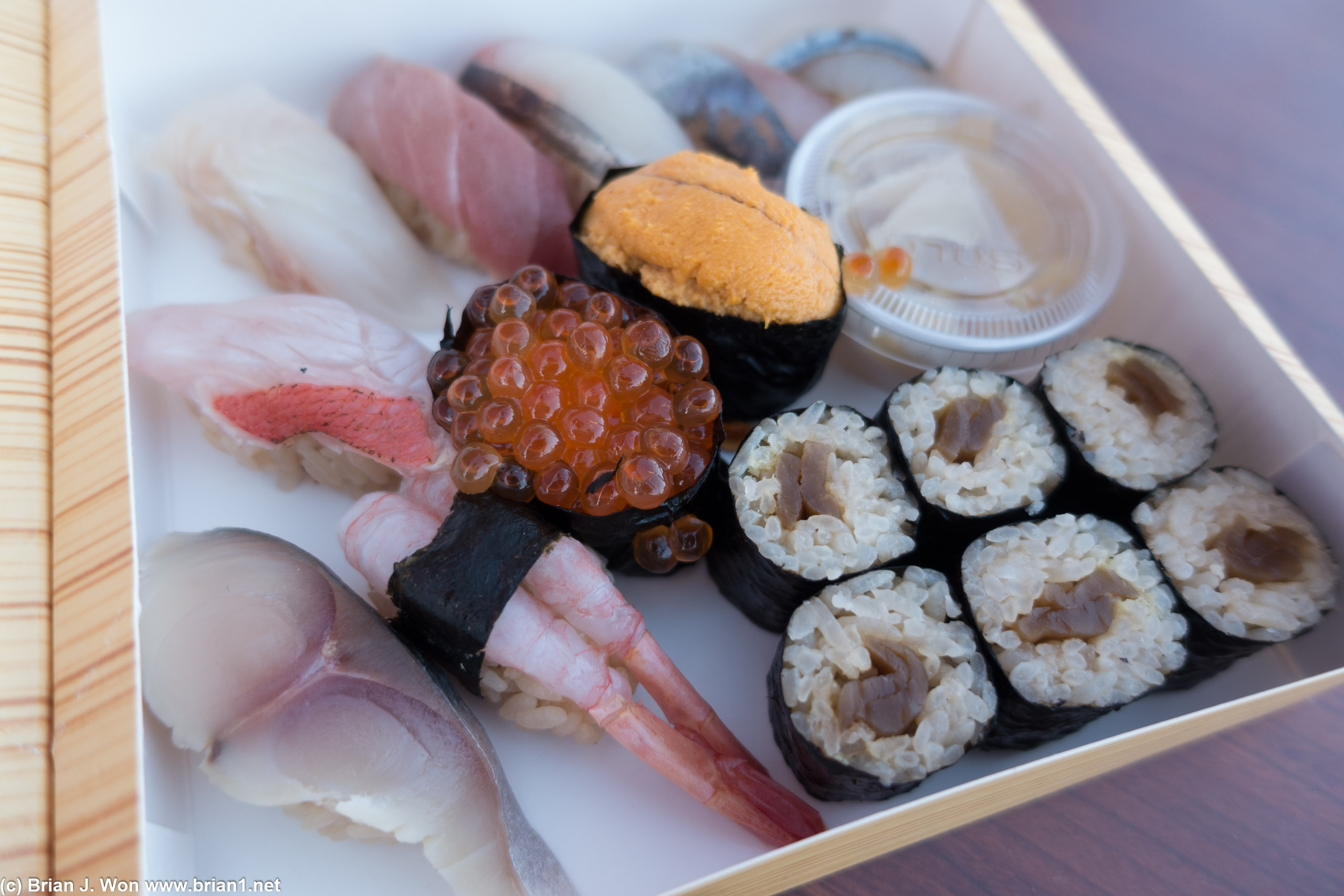Omakase 10 piece box: maguro (tuna), hirame (halibut), kanpachi (amberjack), aji (Spanish mackerel), ikura (salmon roe), amaebi (live sweet shrimp), kinmedai (golden eye snapper), sayori (needle fish), uni (sea urchin), kanpyo roll (squash).