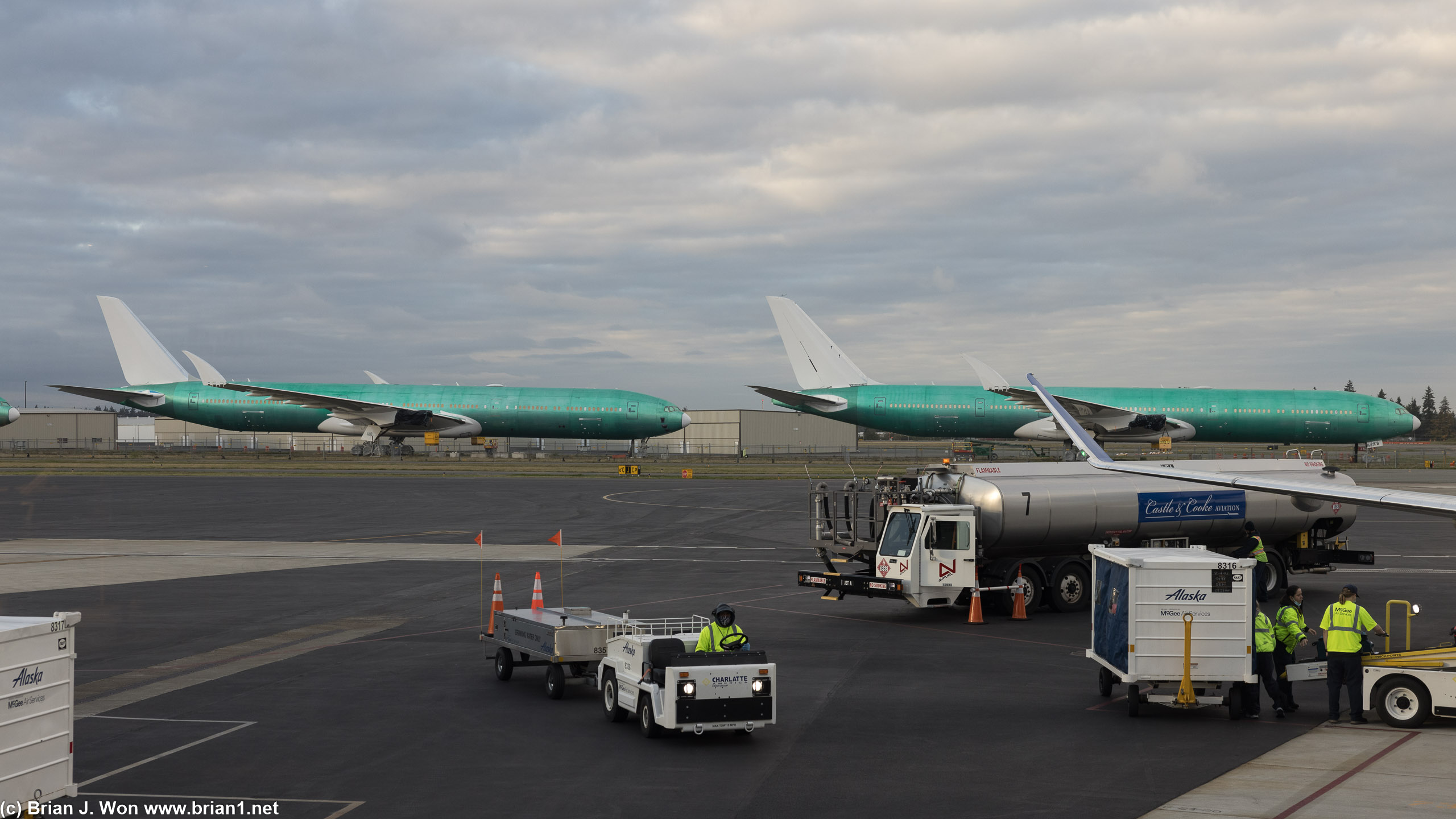 Shiny new 777-9X's in the background.