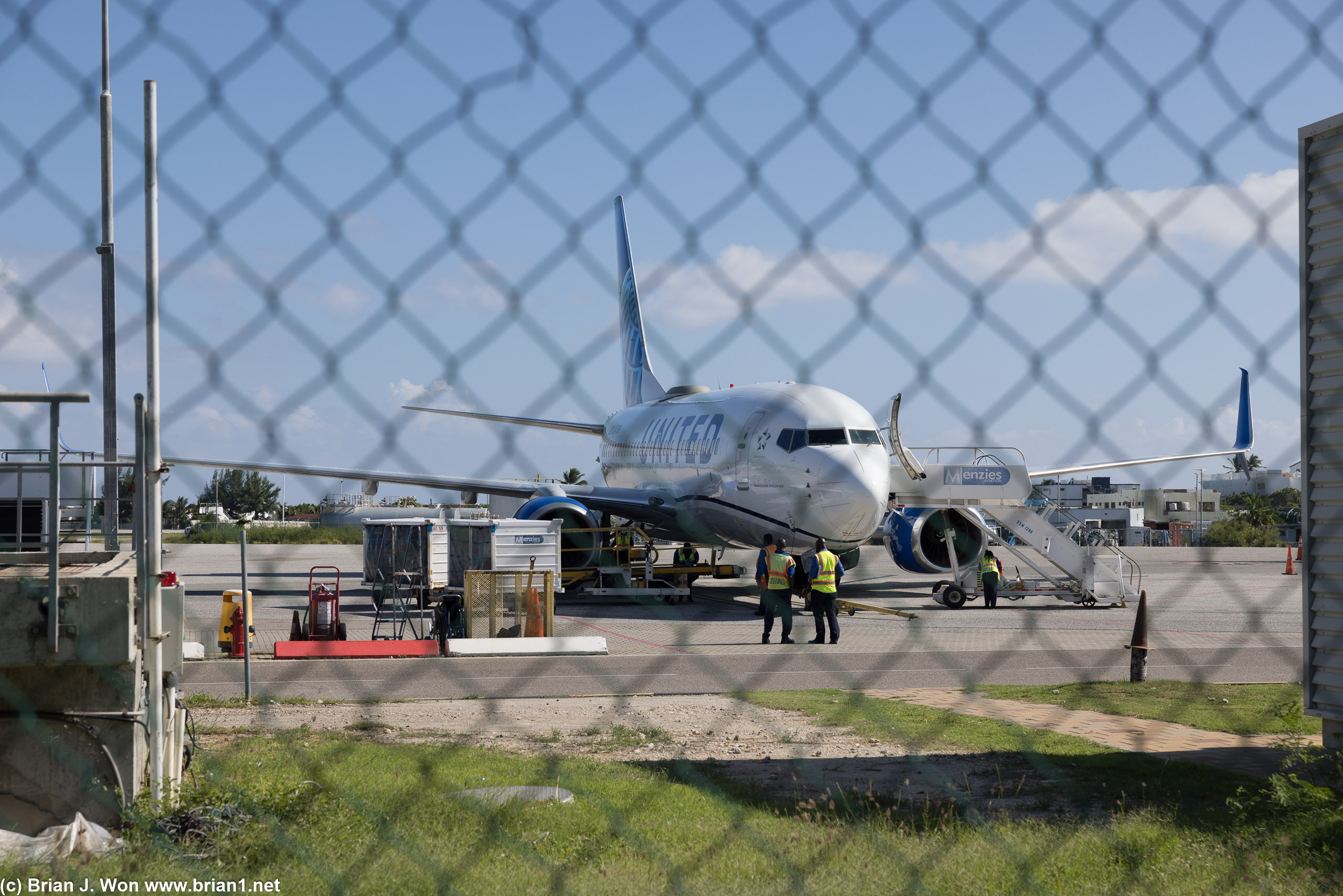 Looking through the fence at the little 737-700 that I was just on.