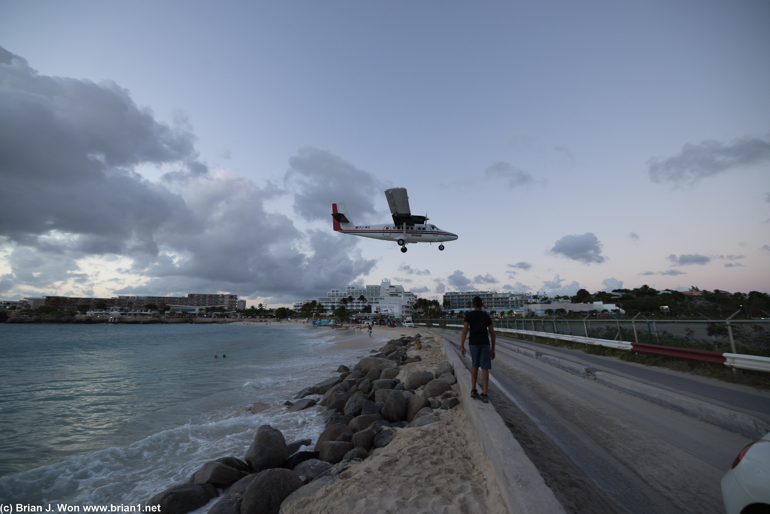 Winair DHC-6-300 on final approach, as viewed from the famous Maho Beach.