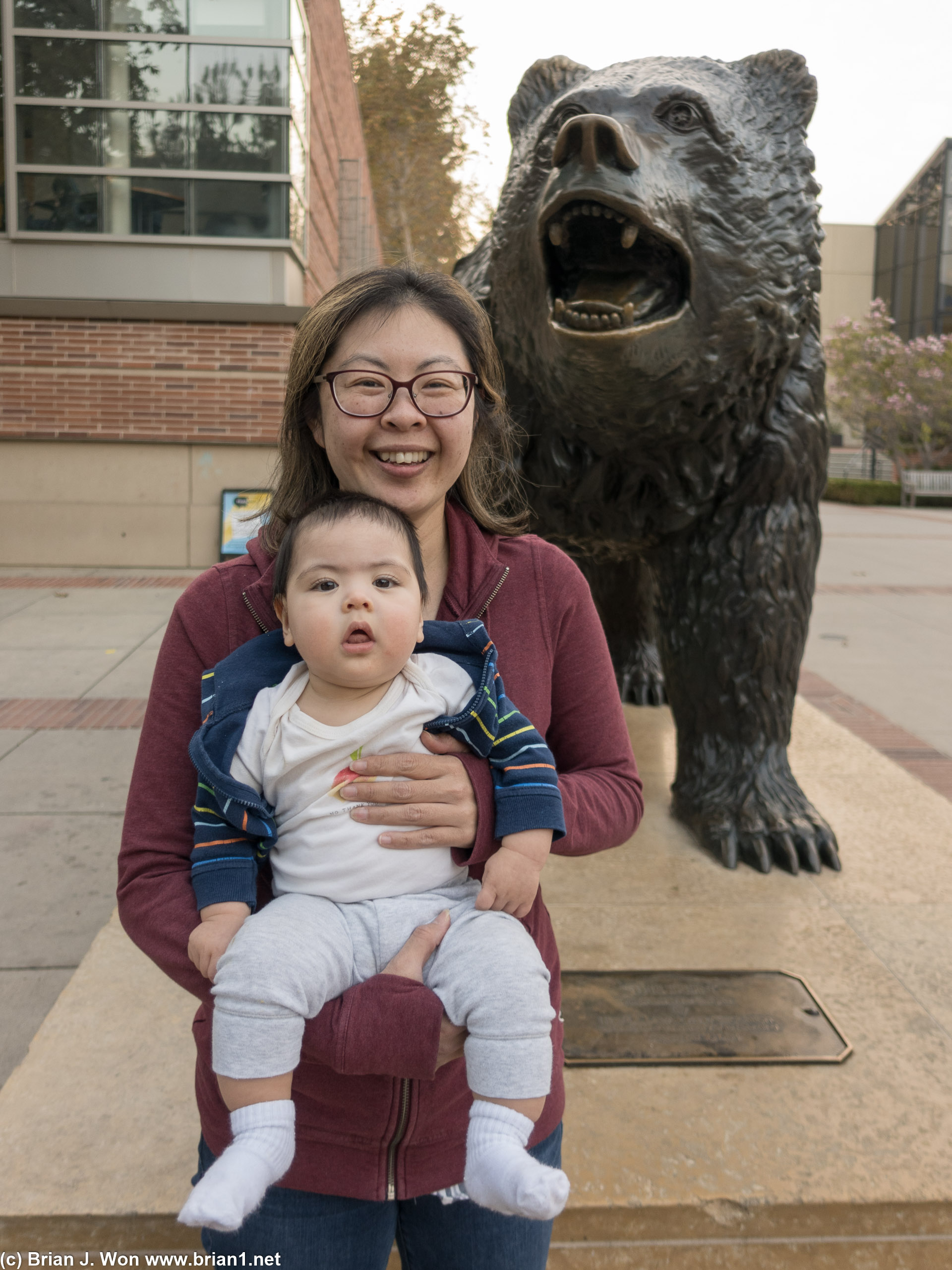 Mother and son in front of the UCLA Bruin Bear.