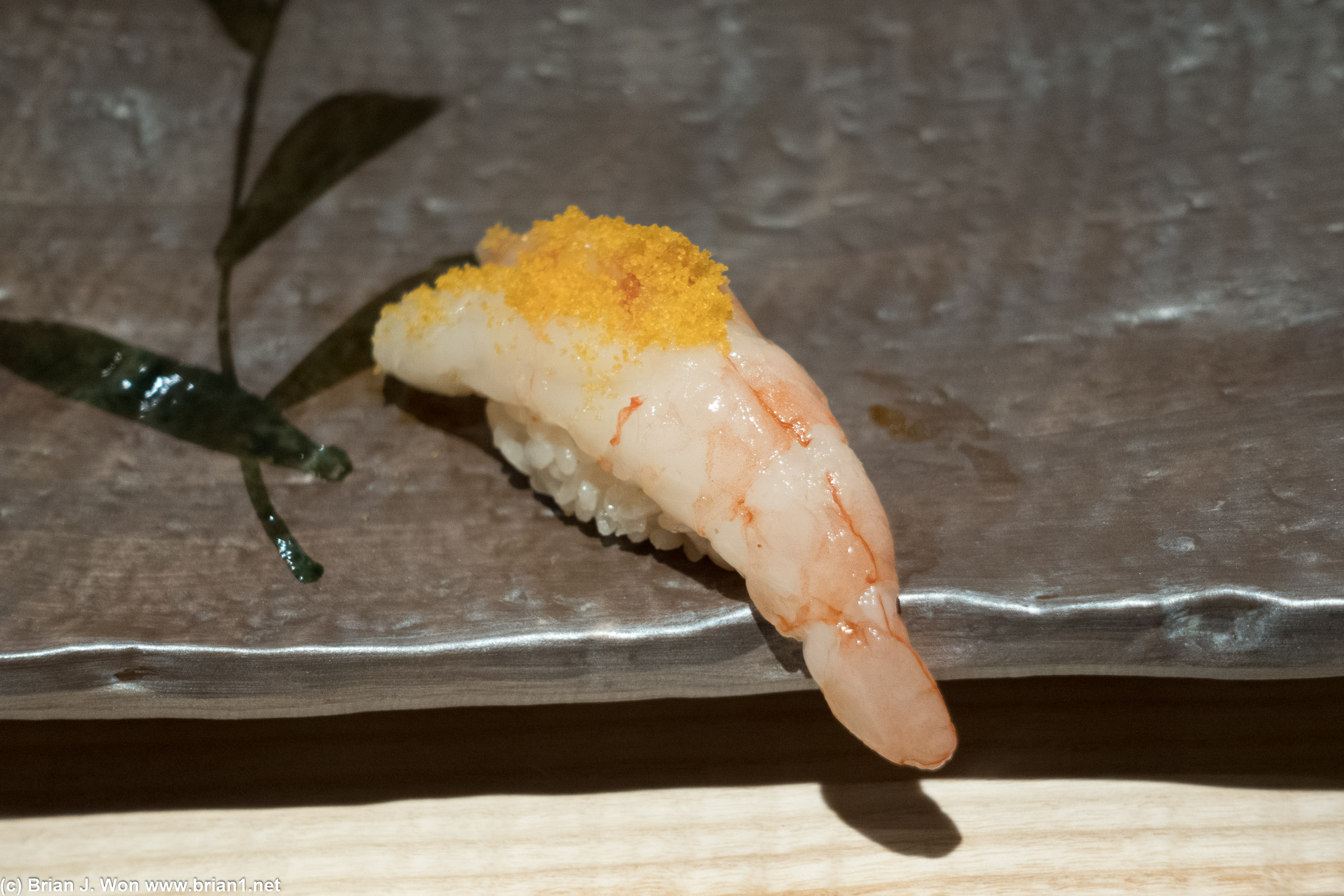 Red shrimp topped with dried millet roe.