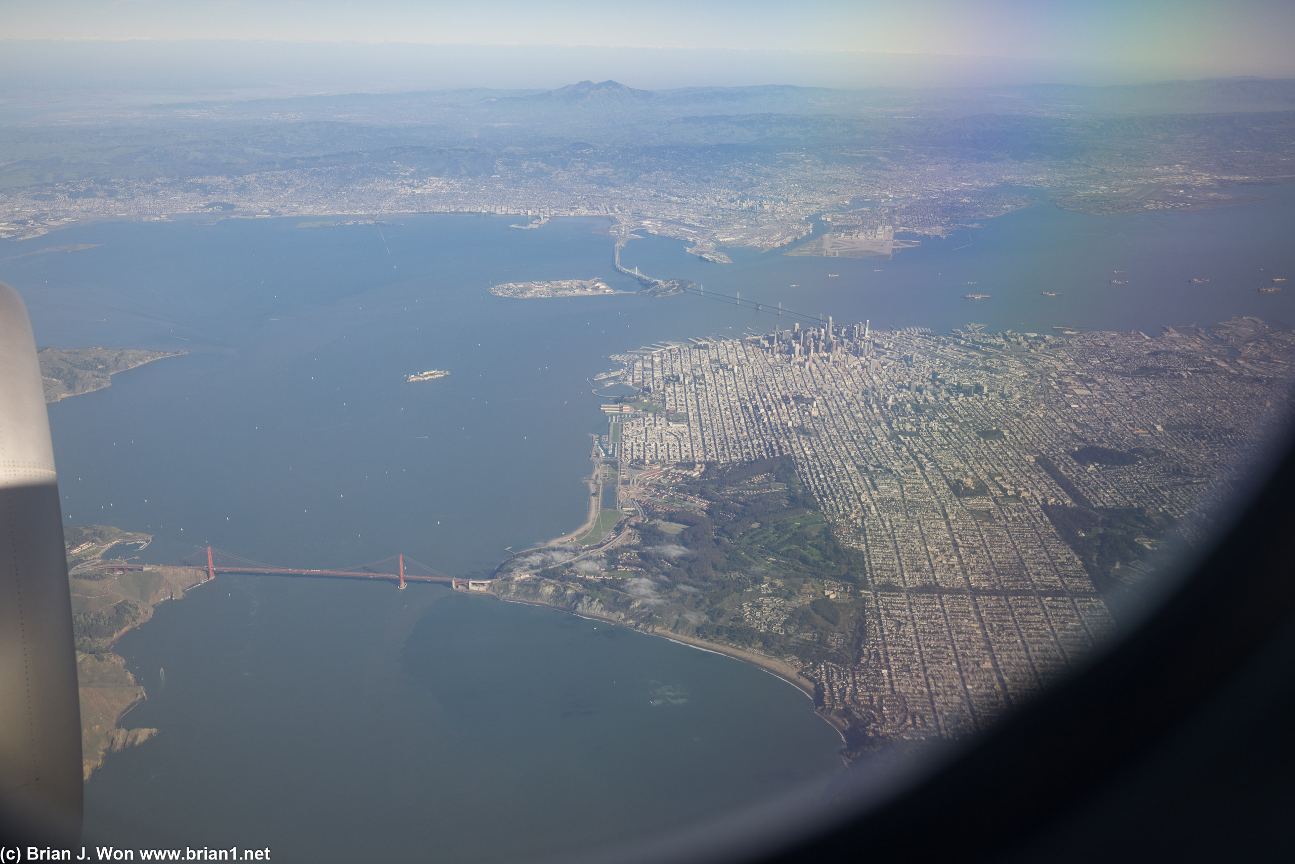Soaring over San Francisco. Note all the container ships waiting to unload.