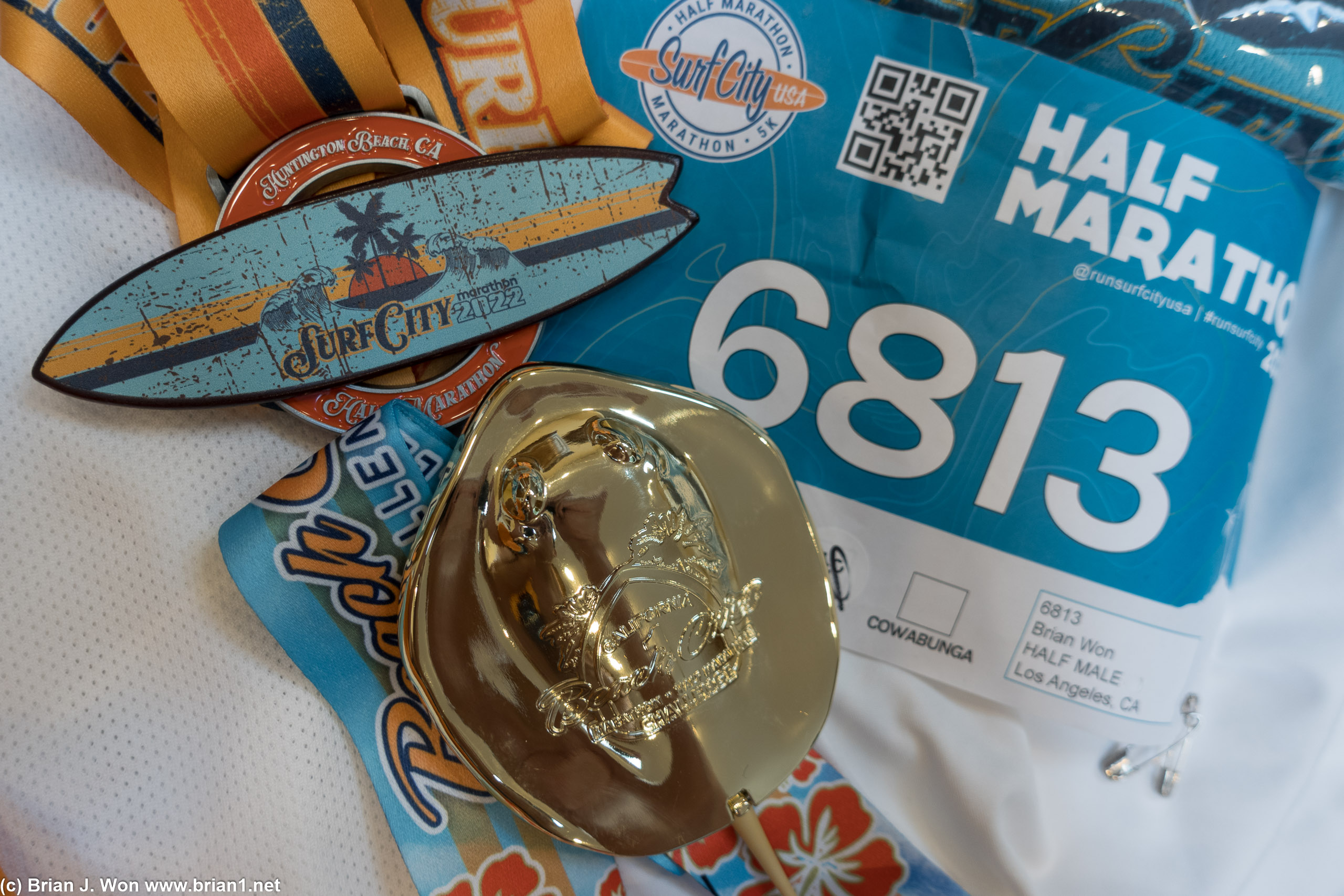 Surf City Half Marathon and Beach Cities Challenge medals.
