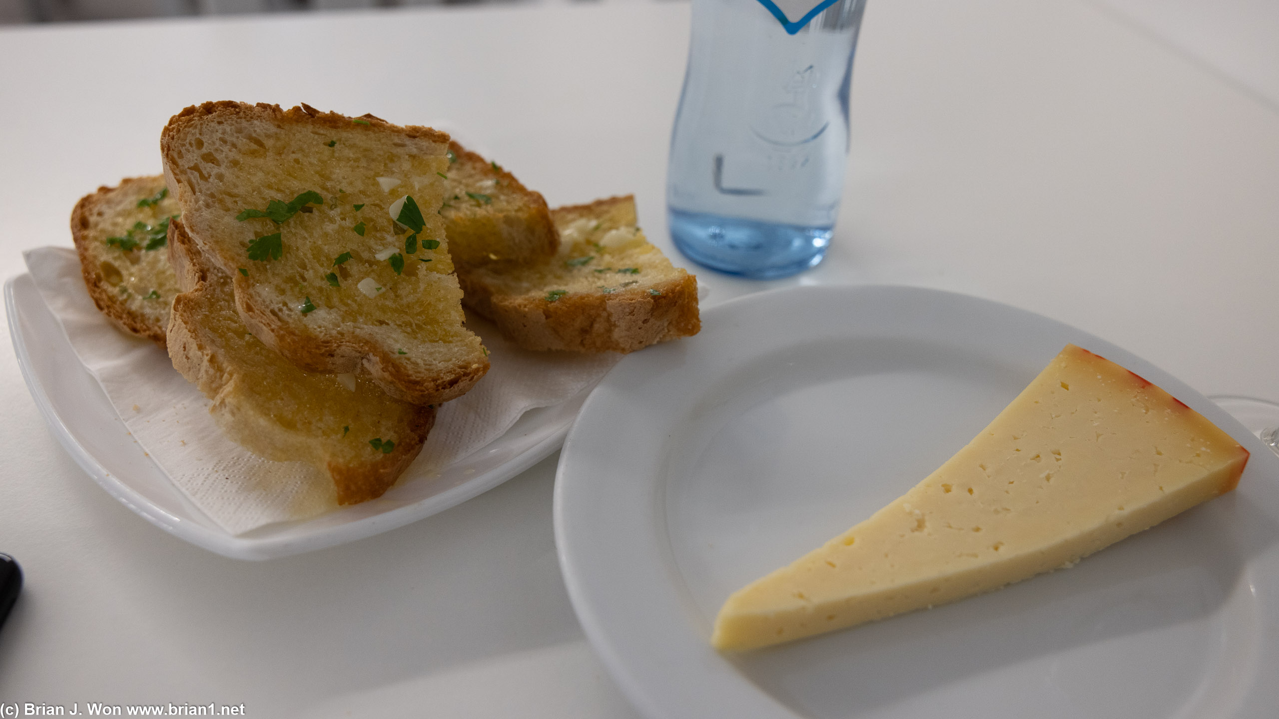 Local cheese is pretty consistent everywhere, the garlic bread was very buttery.