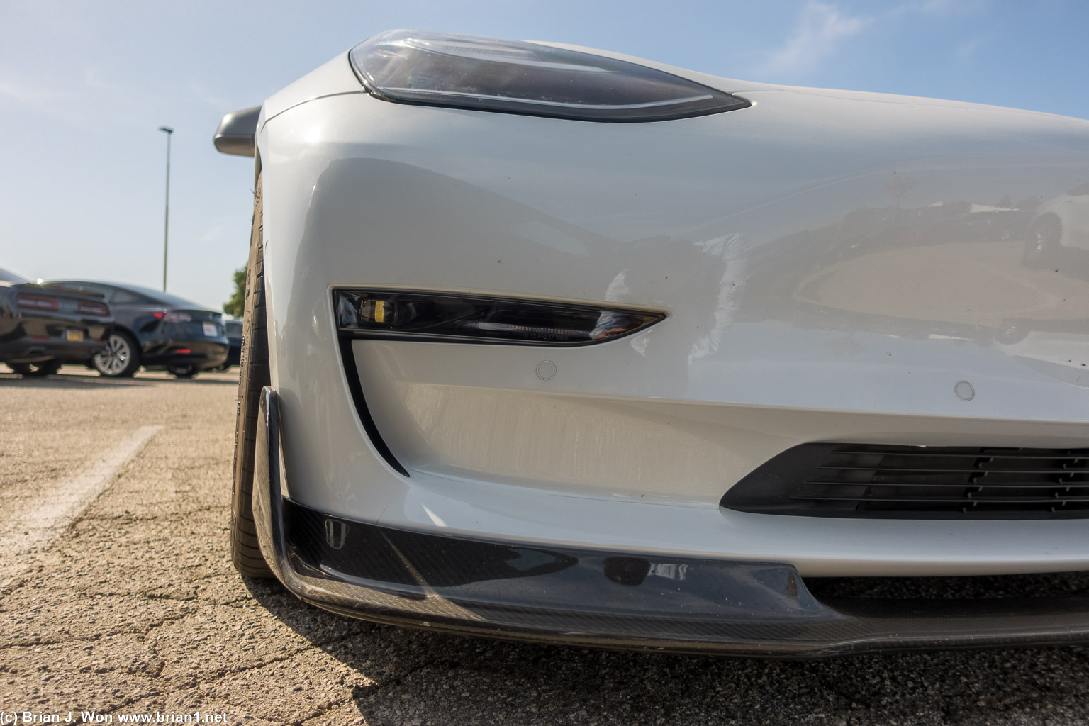 Model 3 Performance with a carbon fiber front lip of some sort.