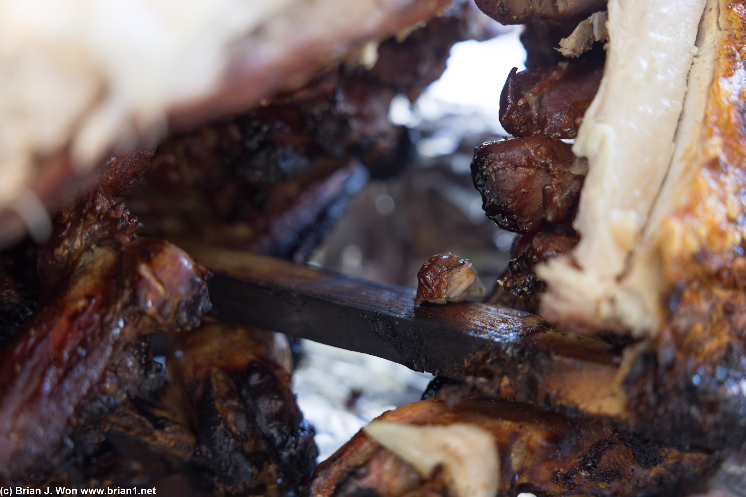 Details in cooking a whole roast pig.